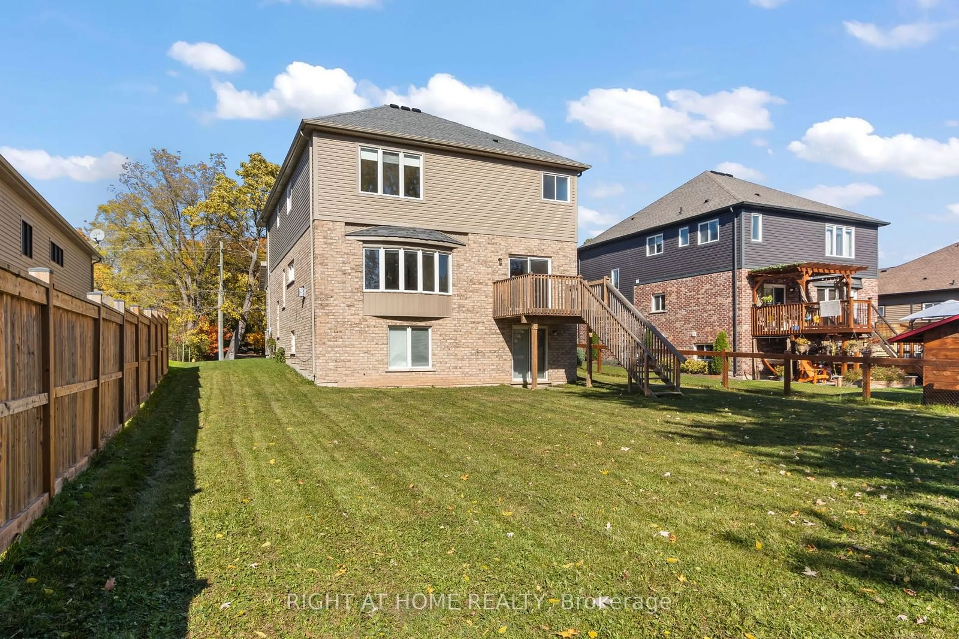 A pic from exterior of the house or condo, the fenced backyard for 3547 Dominion Rd, Fort Erie Ontario L0S 1N0