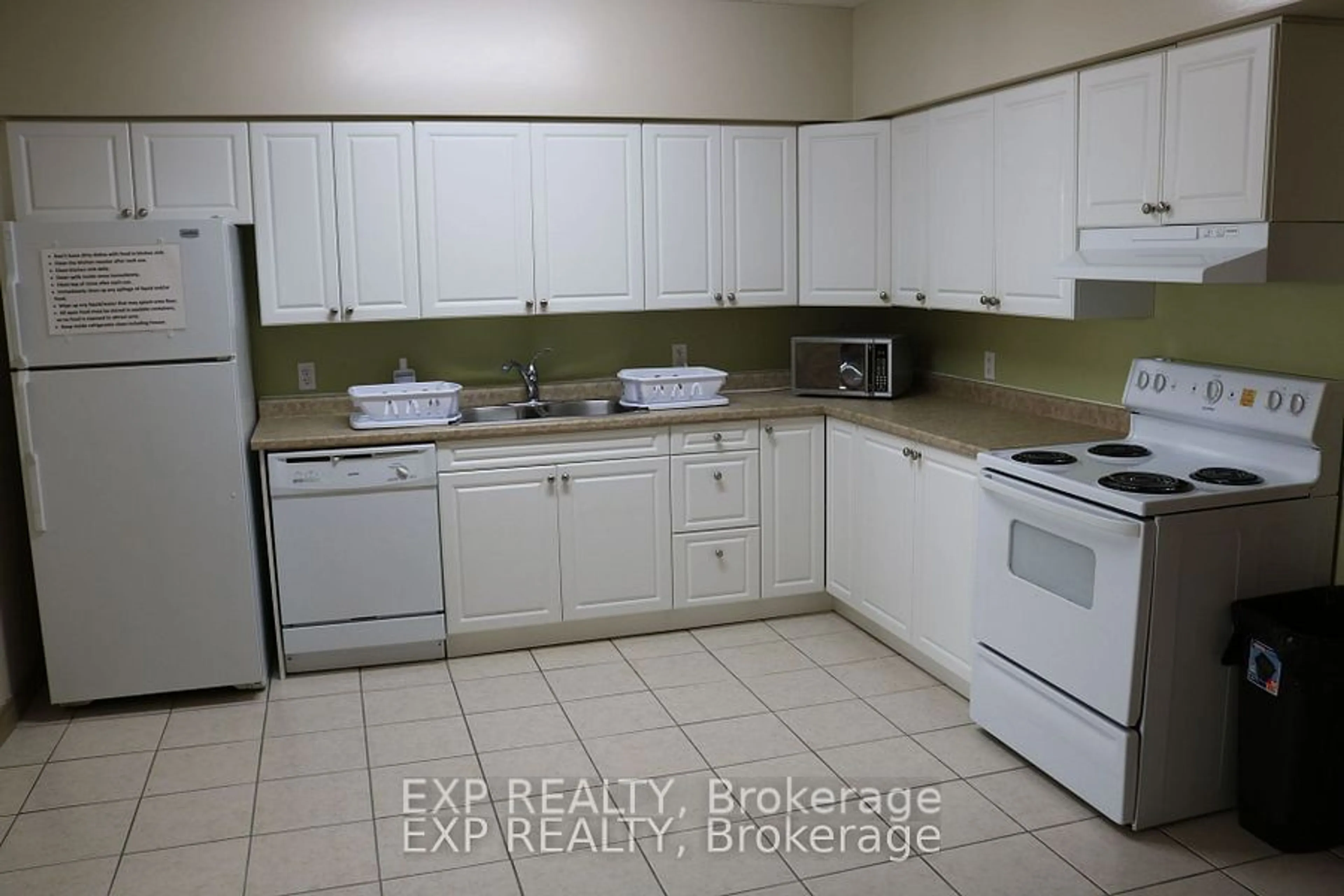 Standard kitchen, ceramic floors, cottage for 271 Lester St #203, Waterloo Ontario N2L 3W6