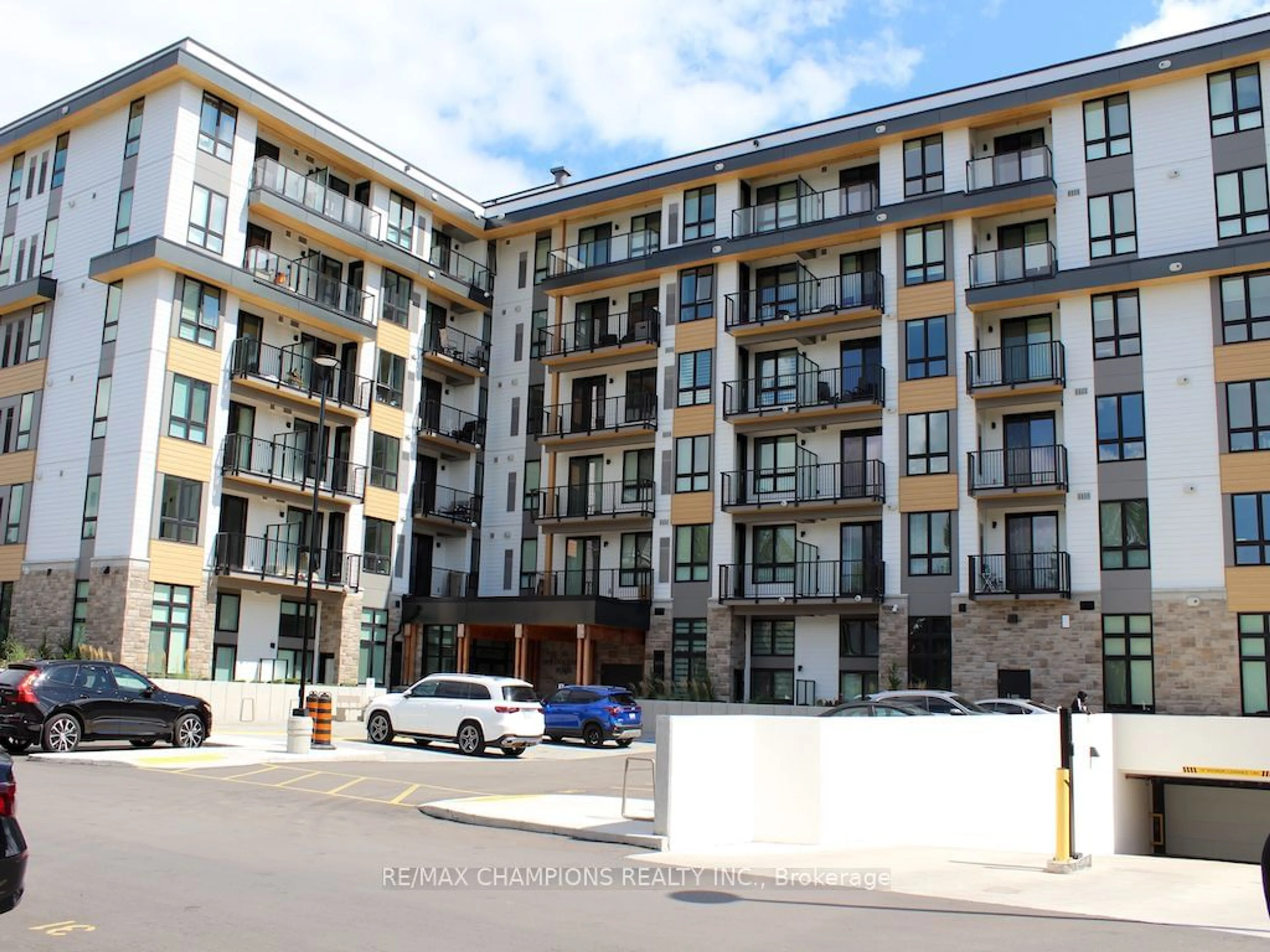 A pic from exterior of the house or condo, the front or back of building for 101 Golden Eagle Rd #302, Waterloo Ontario N2V 0H4