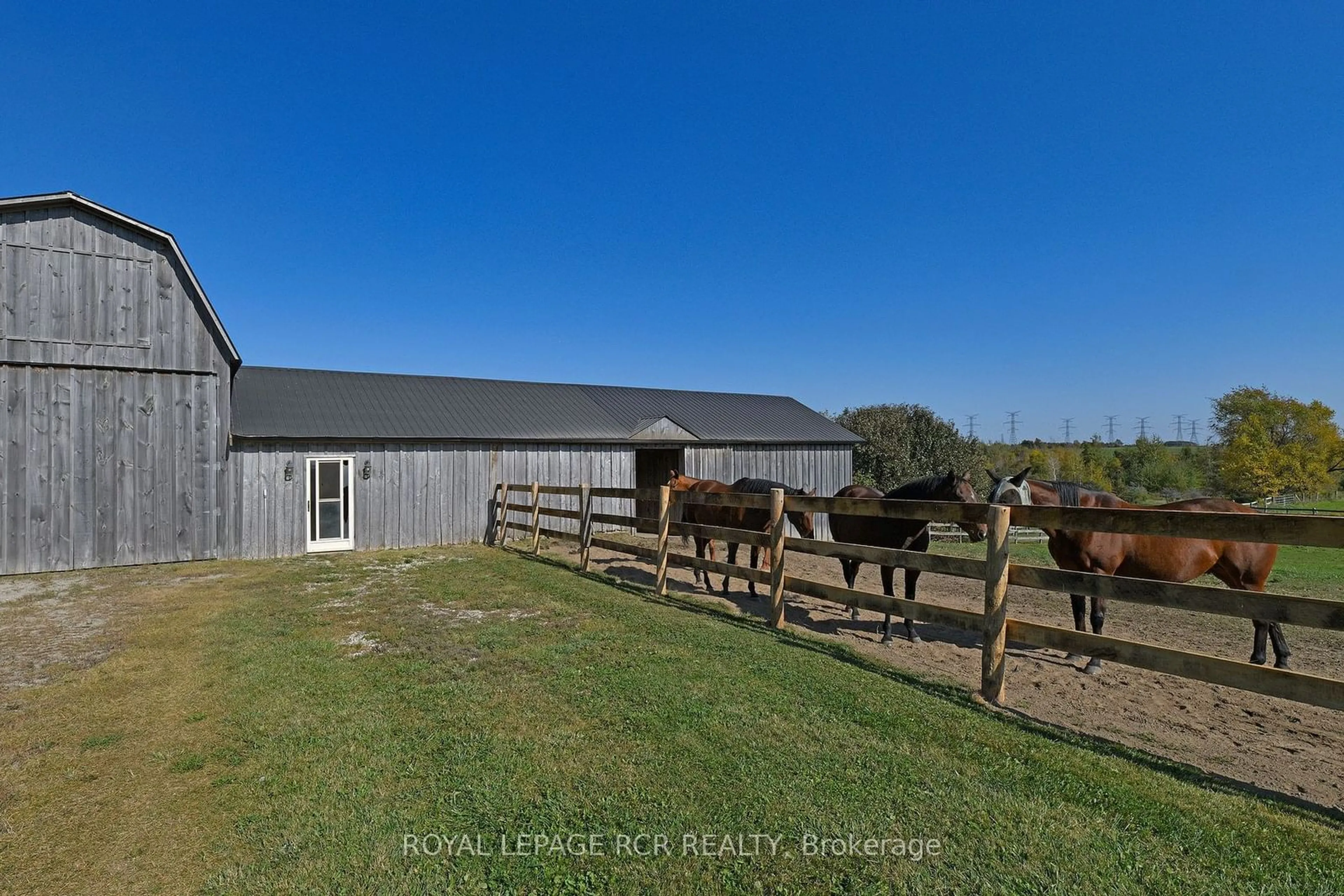 A pic from exterior of the house or condo, the fenced backyard for 071533 10th Line, East Garafraxa Ontario L9W 7A1