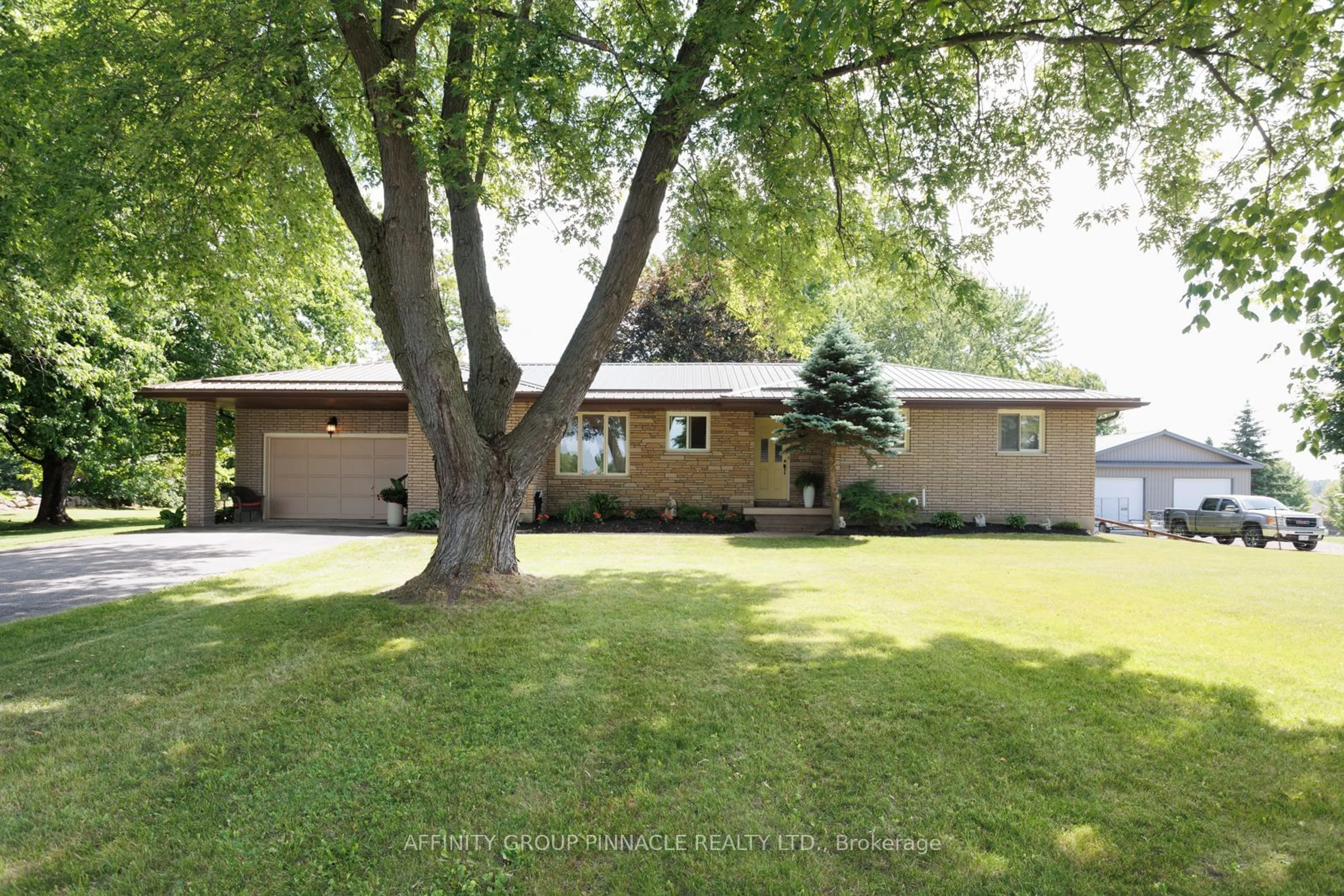 Frontside or backside of a home, the street view for 116 Beach Rd, Kawartha Lakes Ontario K0M 2C0