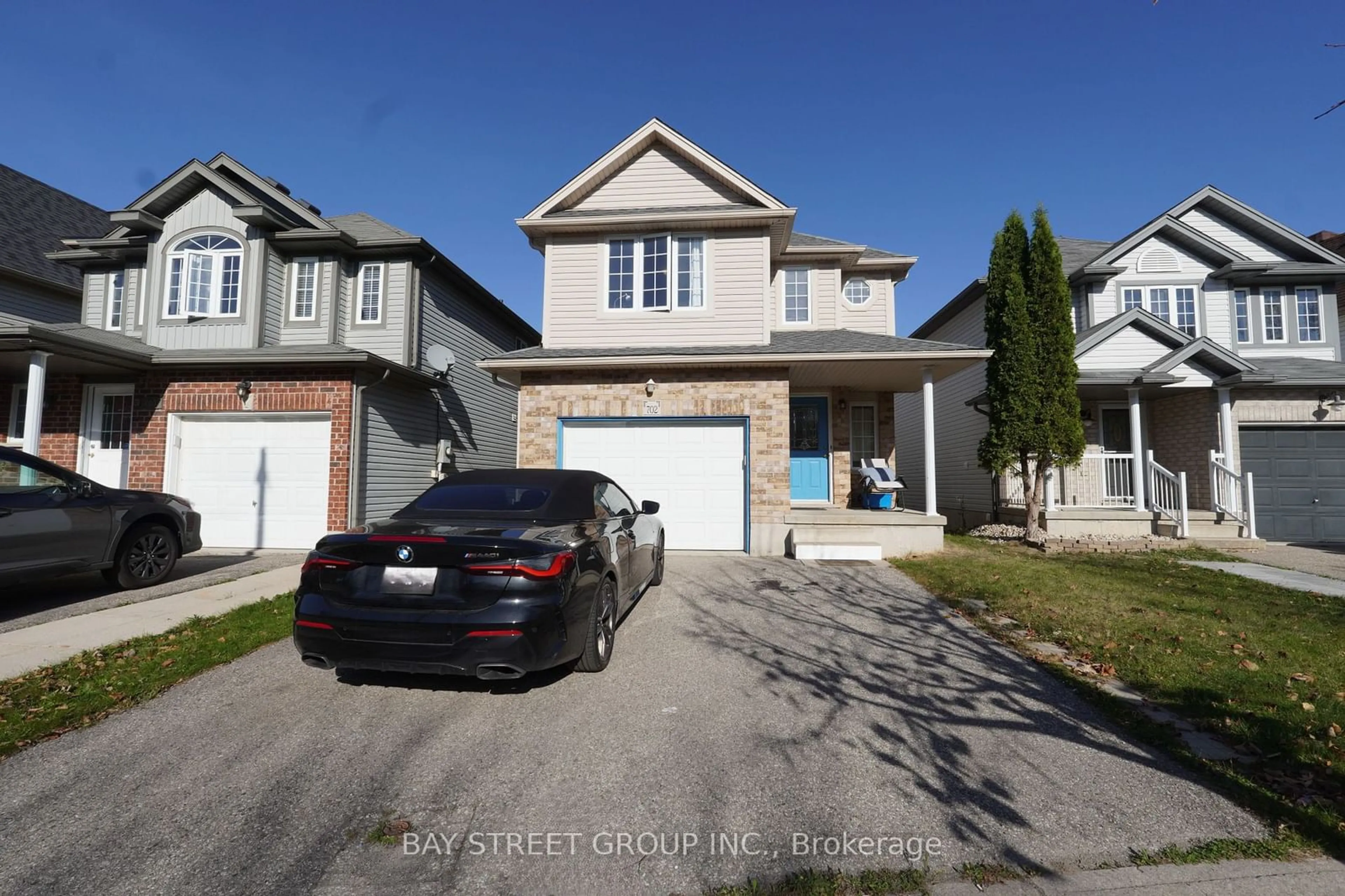 Frontside or backside of a home, the street view for 702 Wild Ginger Ave, Waterloo Ontario N2V 2T6