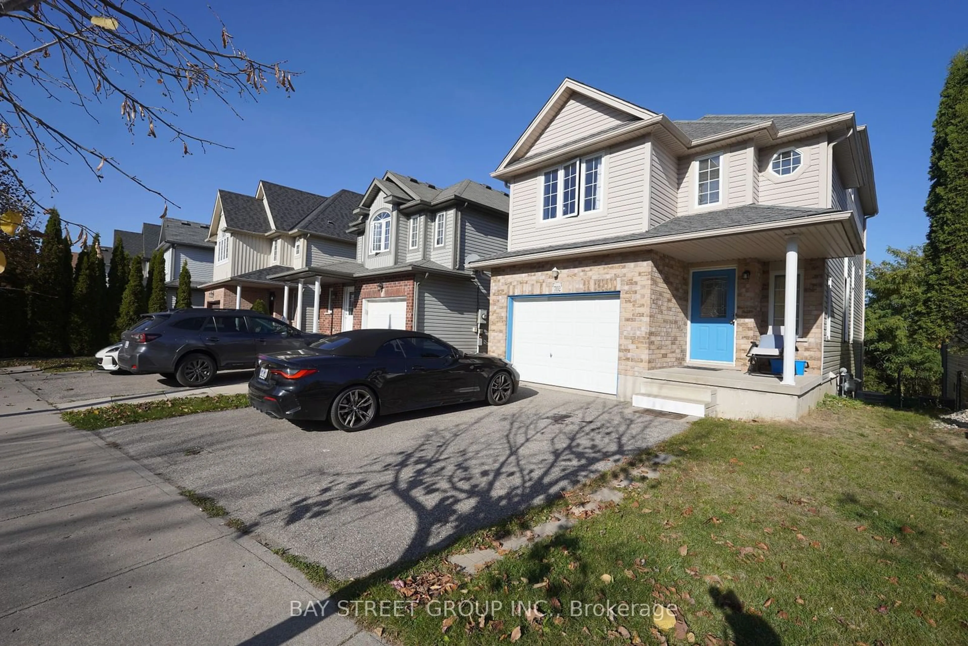 A pic from exterior of the house or condo, the street view for 702 Wild Ginger Ave, Waterloo Ontario N2V 2T6