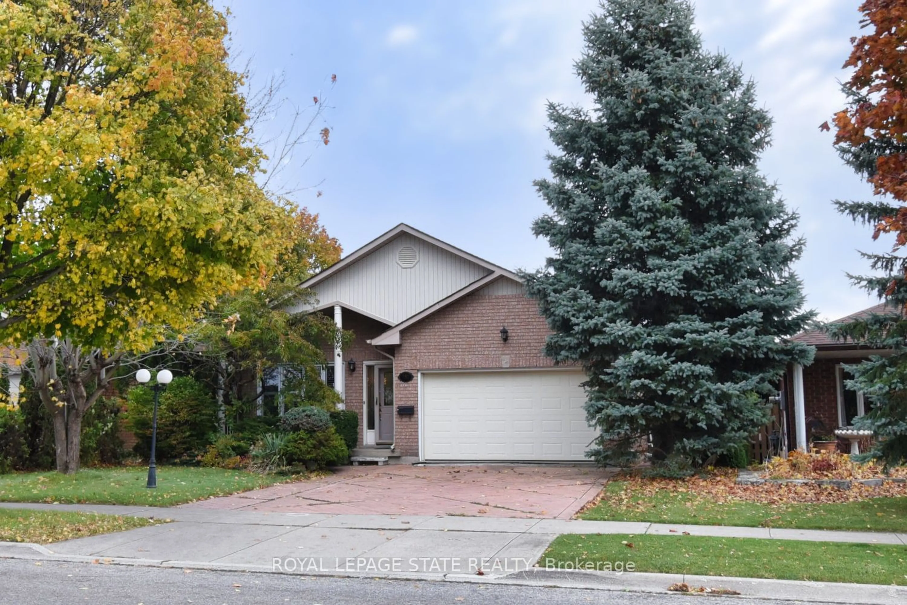 Frontside or backside of a home, the street view for 282 Winterberry Dr, Hamilton Ontario L8J 2N5