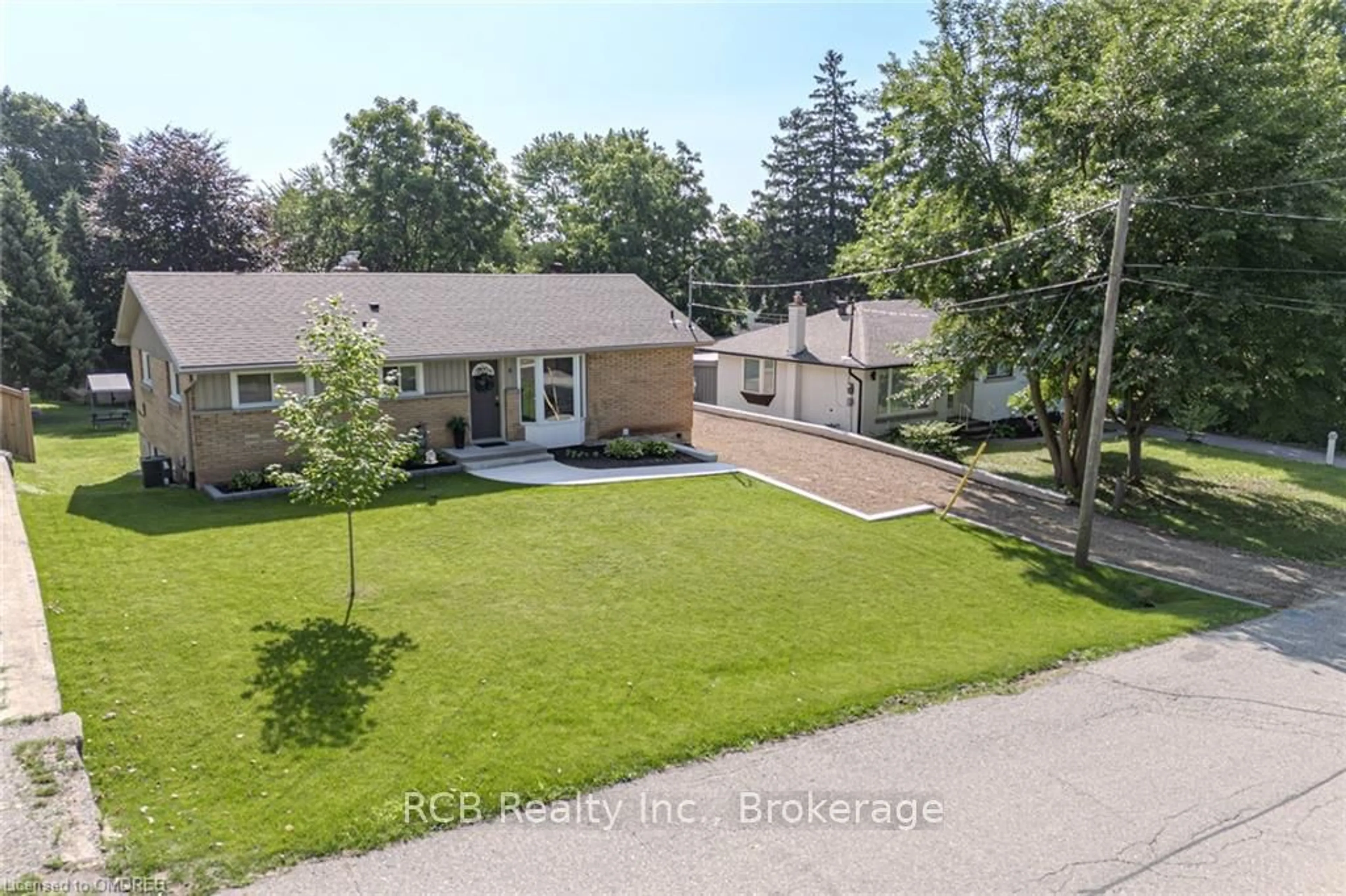 Frontside or backside of a home, the street view for 6 LILLIAN St, Brant Ontario N0E 1N0