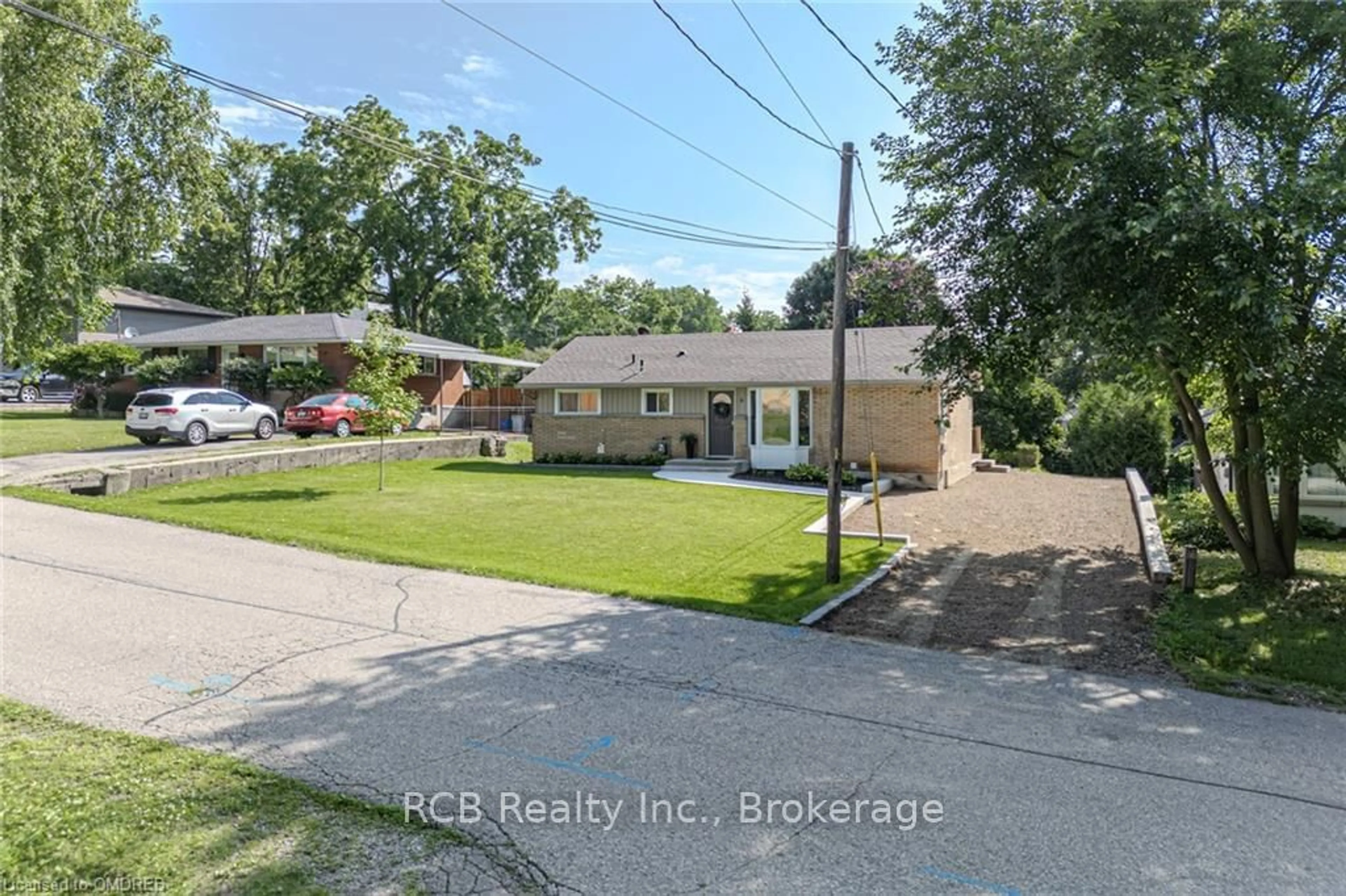 Frontside or backside of a home, the street view for 6 LILLIAN St, Brant Ontario N0E 1N0