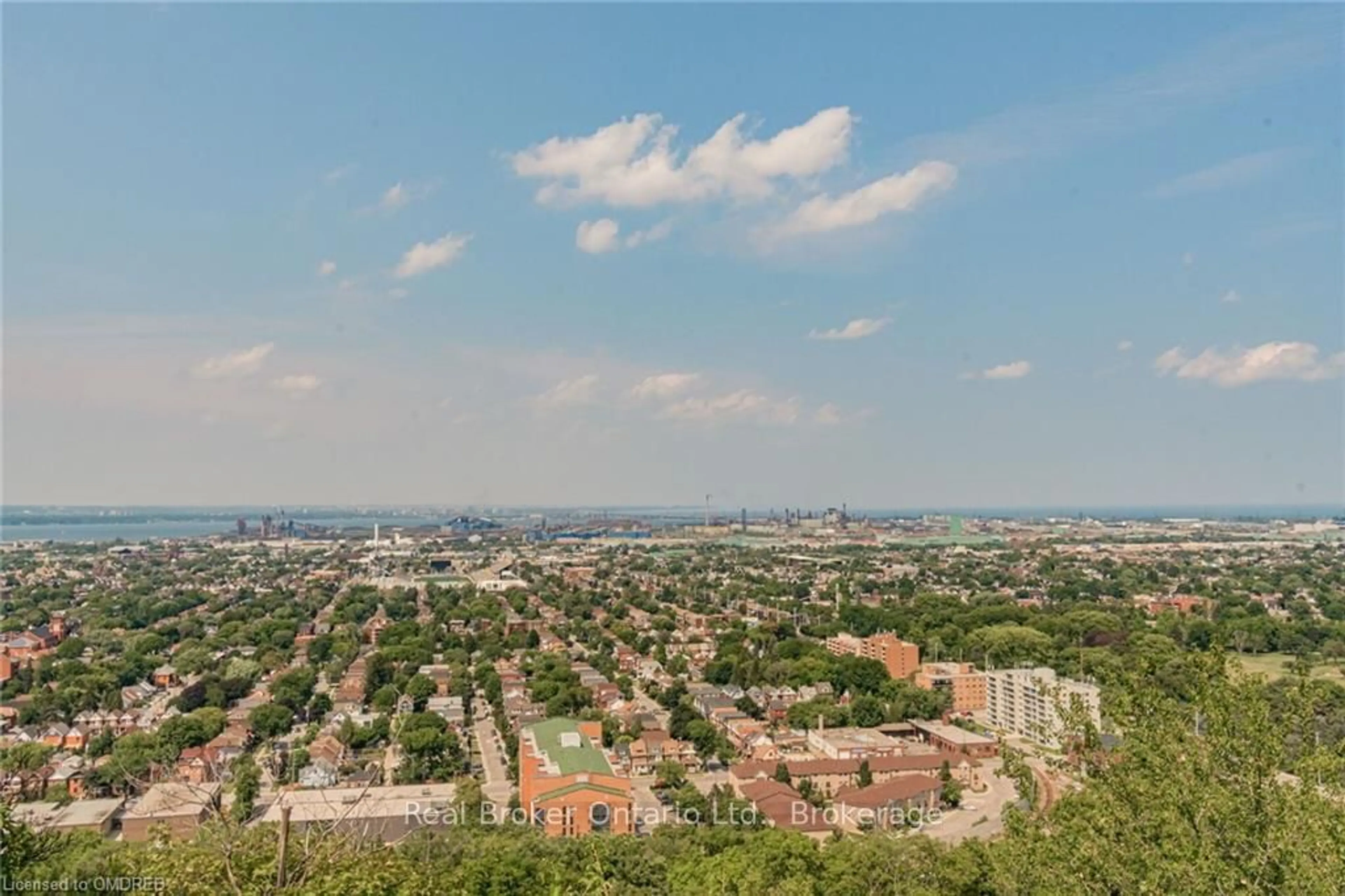 A pic from exterior of the house or condo, the view of city buildings for 5 EAST 36TH St #205C, Hamilton Ontario L8V 3Y6