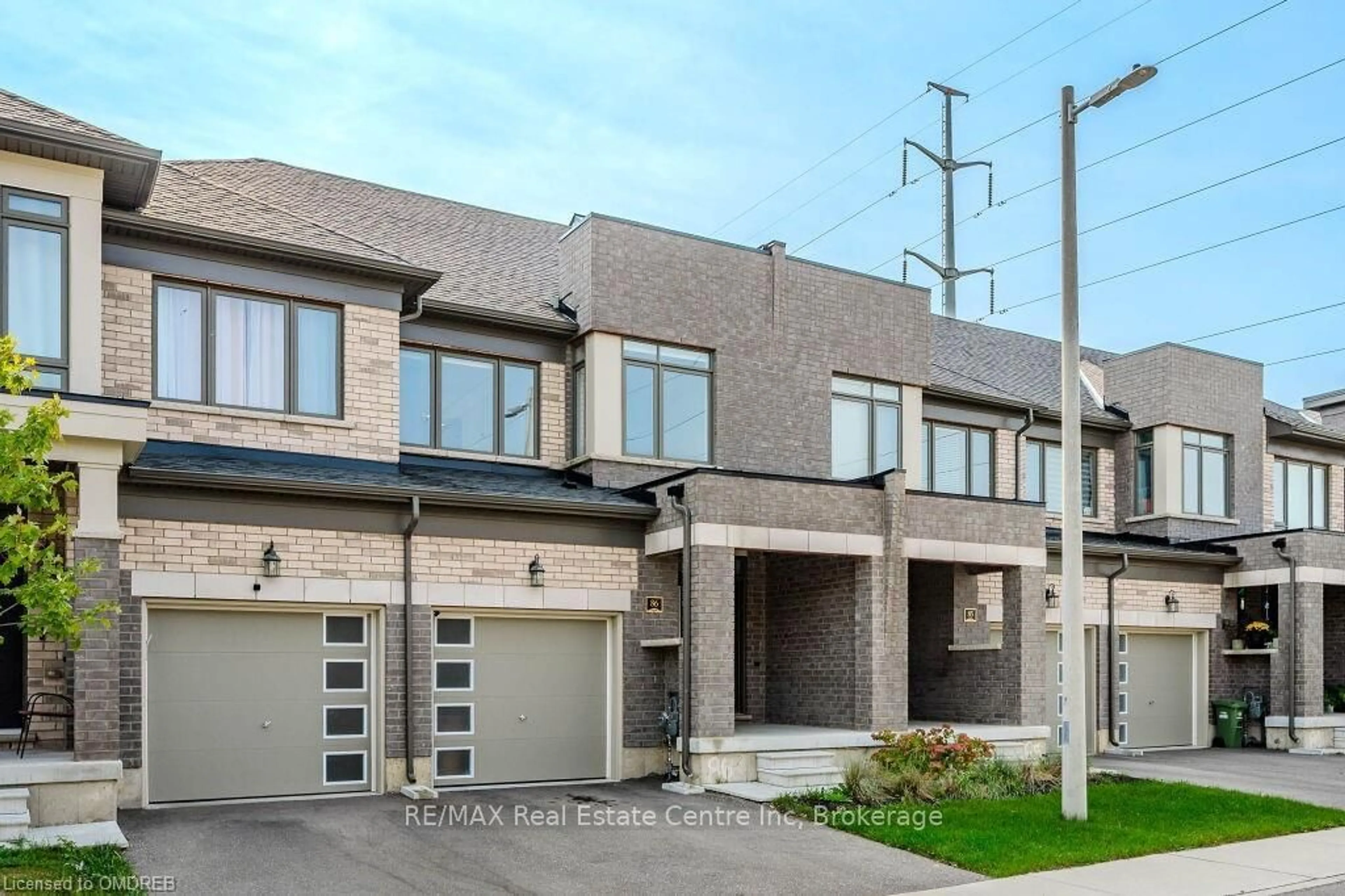 A pic from exterior of the house or condo, the street view for 166 DEERPATH Dr #86, Guelph Ontario N1K 0E2