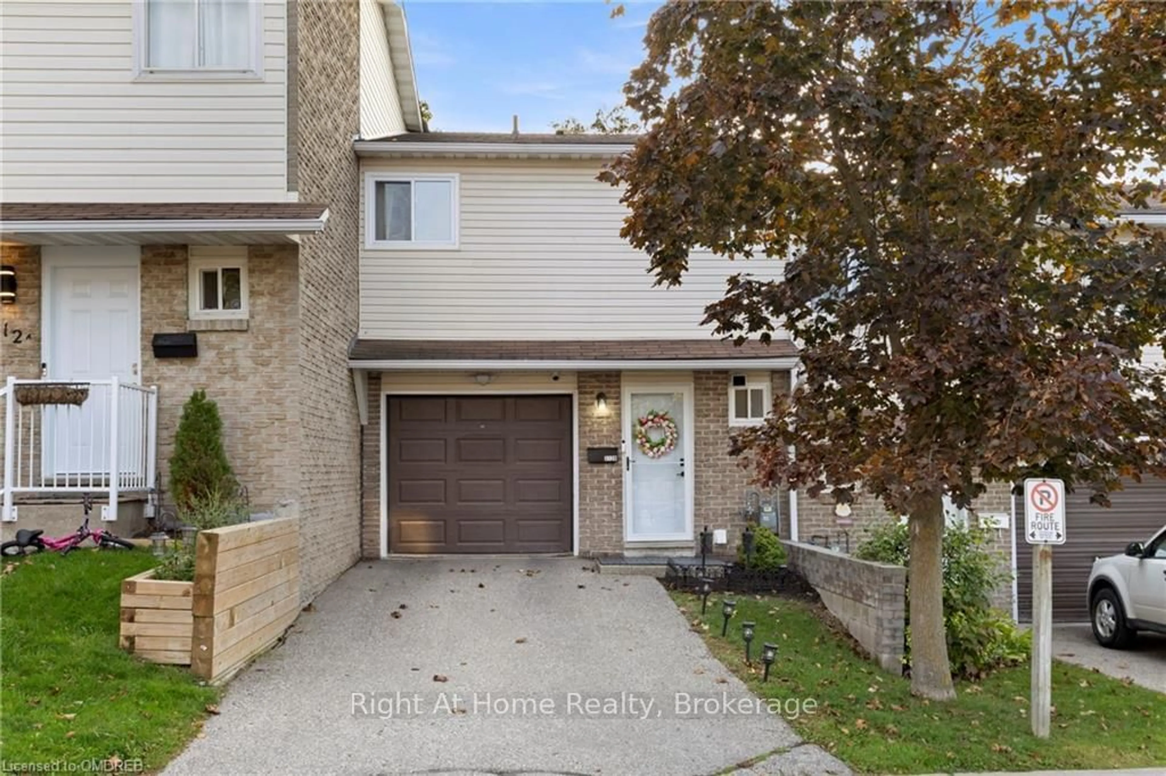 A pic from exterior of the house or condo, the street view for 312B BLUEVALE St, Waterloo Ontario N2J 4G3