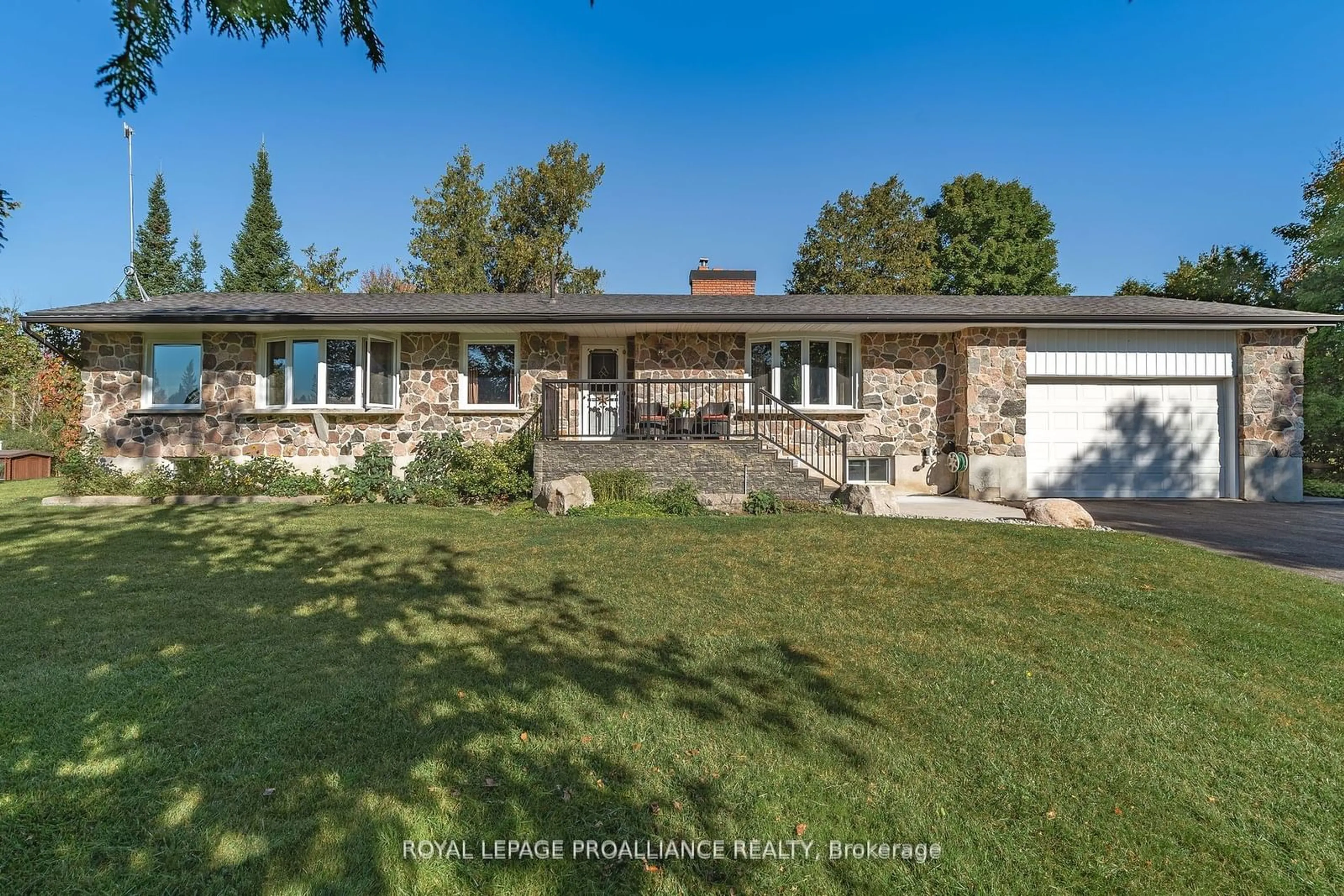 Frontside or backside of a home, the fenced backyard for 1981 Casey Rd, Belleville Ontario K8N 4Z6