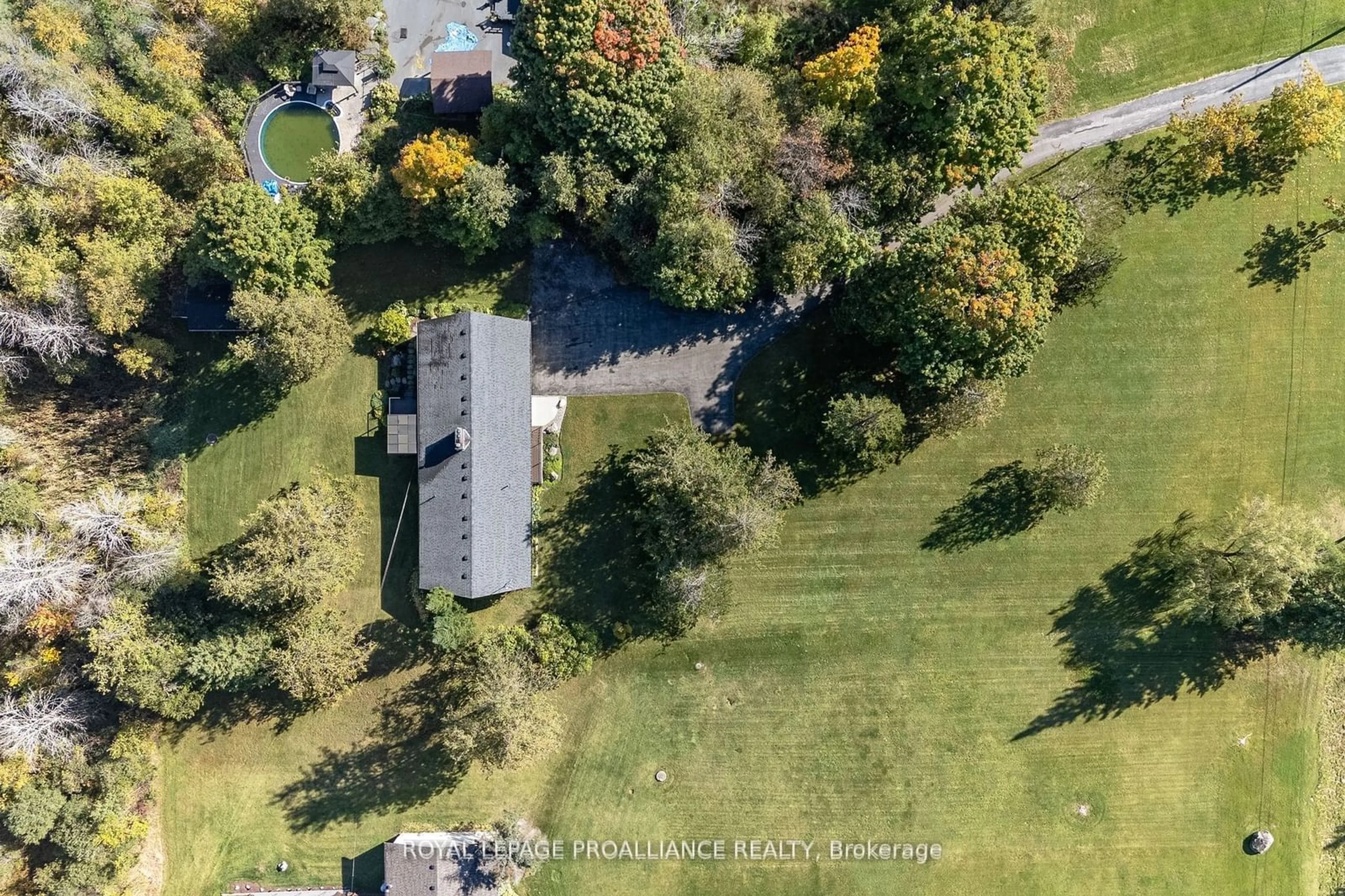 Frontside or backside of a home, the fenced backyard for 1981 Casey Rd, Belleville Ontario K8N 4Z6