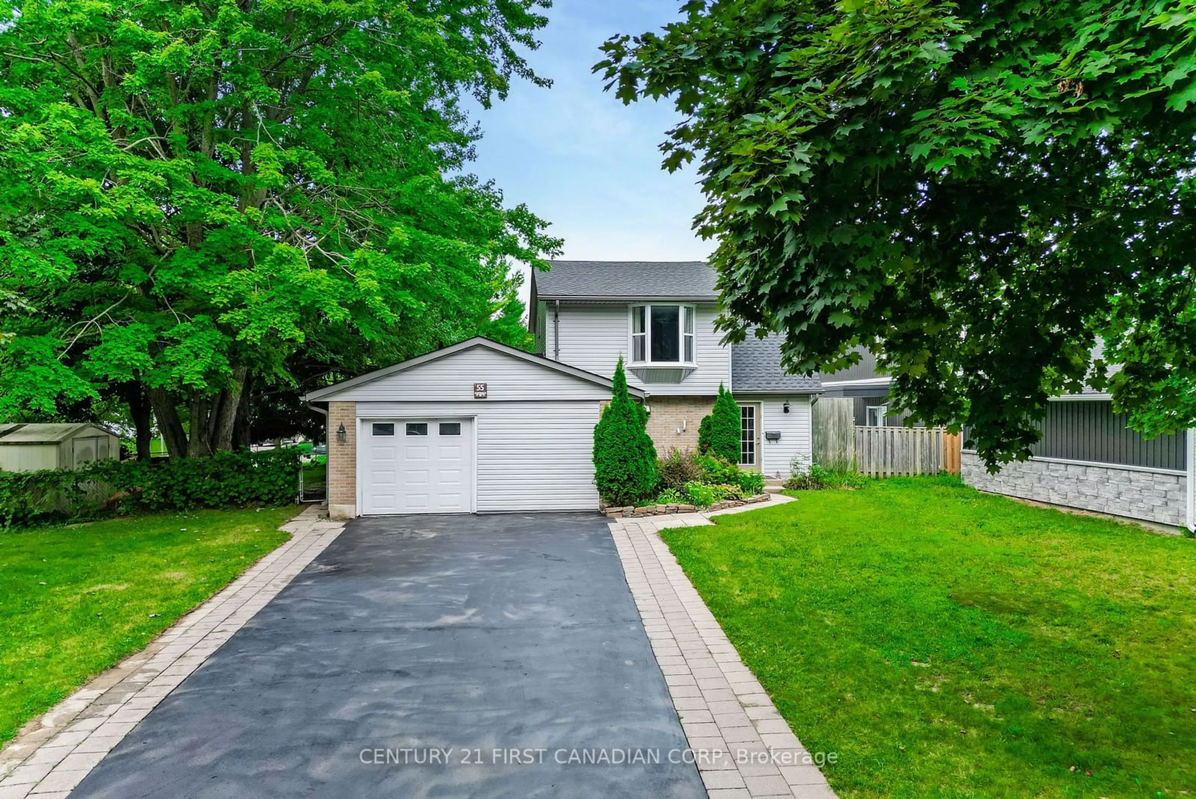 Frontside or backside of a home, the street view for 55 Yew Tree Gdns, London Ontario N6G 2S9