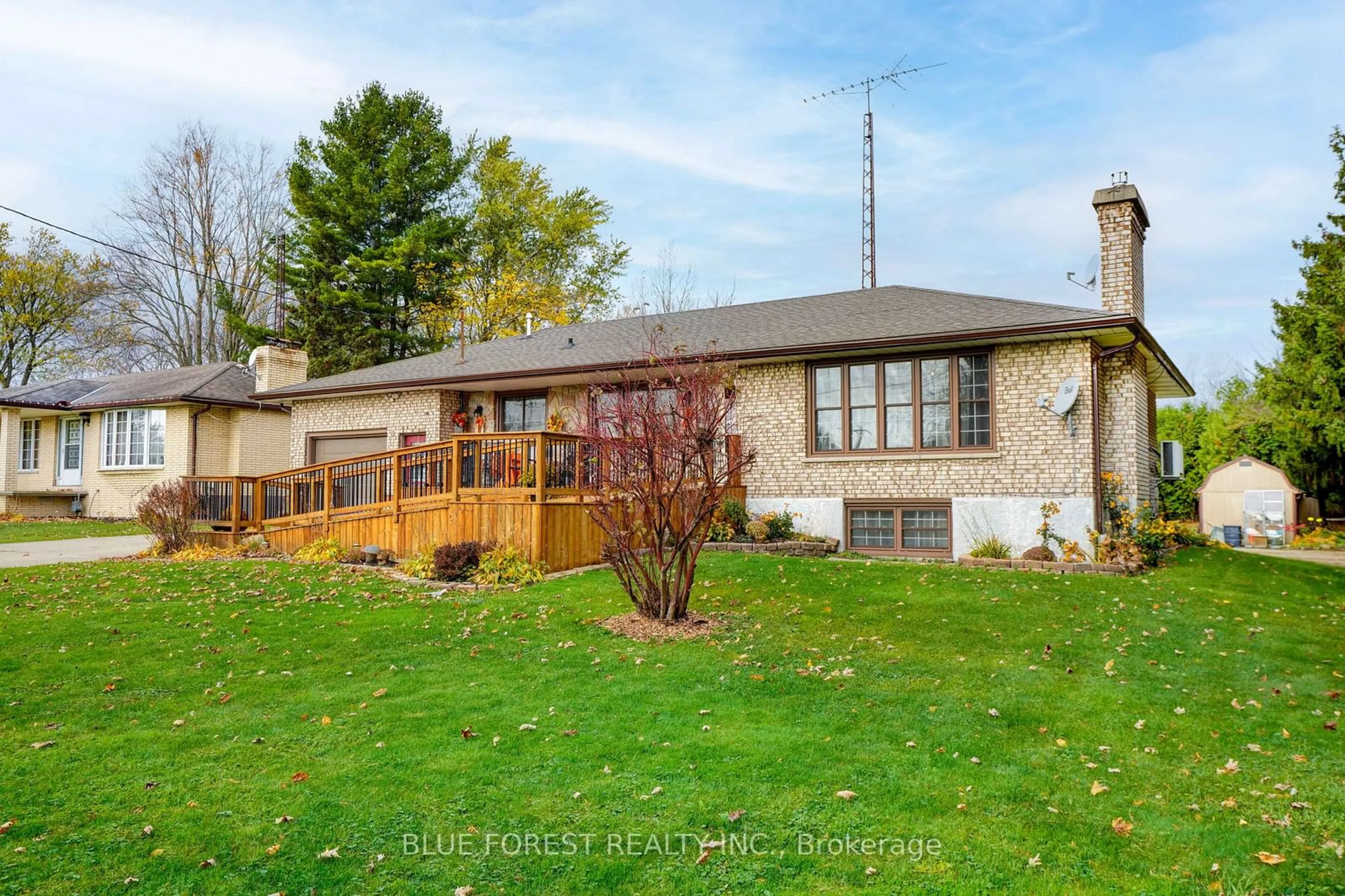 Frontside or backside of a home, the fenced backyard for 24898 Pioneer Line, West Elgin Ontario N0L 2P0