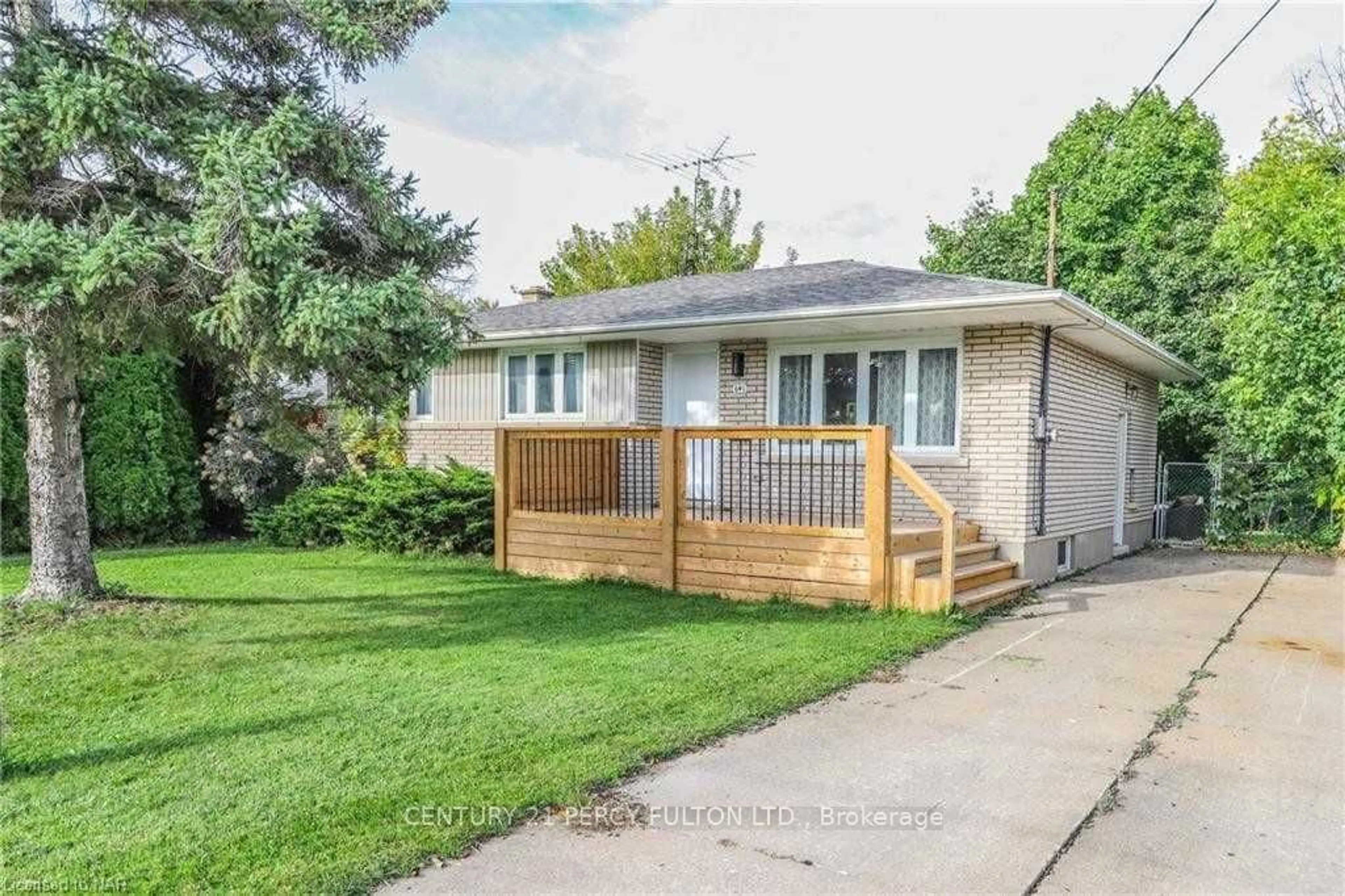 Frontside or backside of a home, the fenced backyard for 641 Niagara St, St. Catharines Ontario L0S 1J0