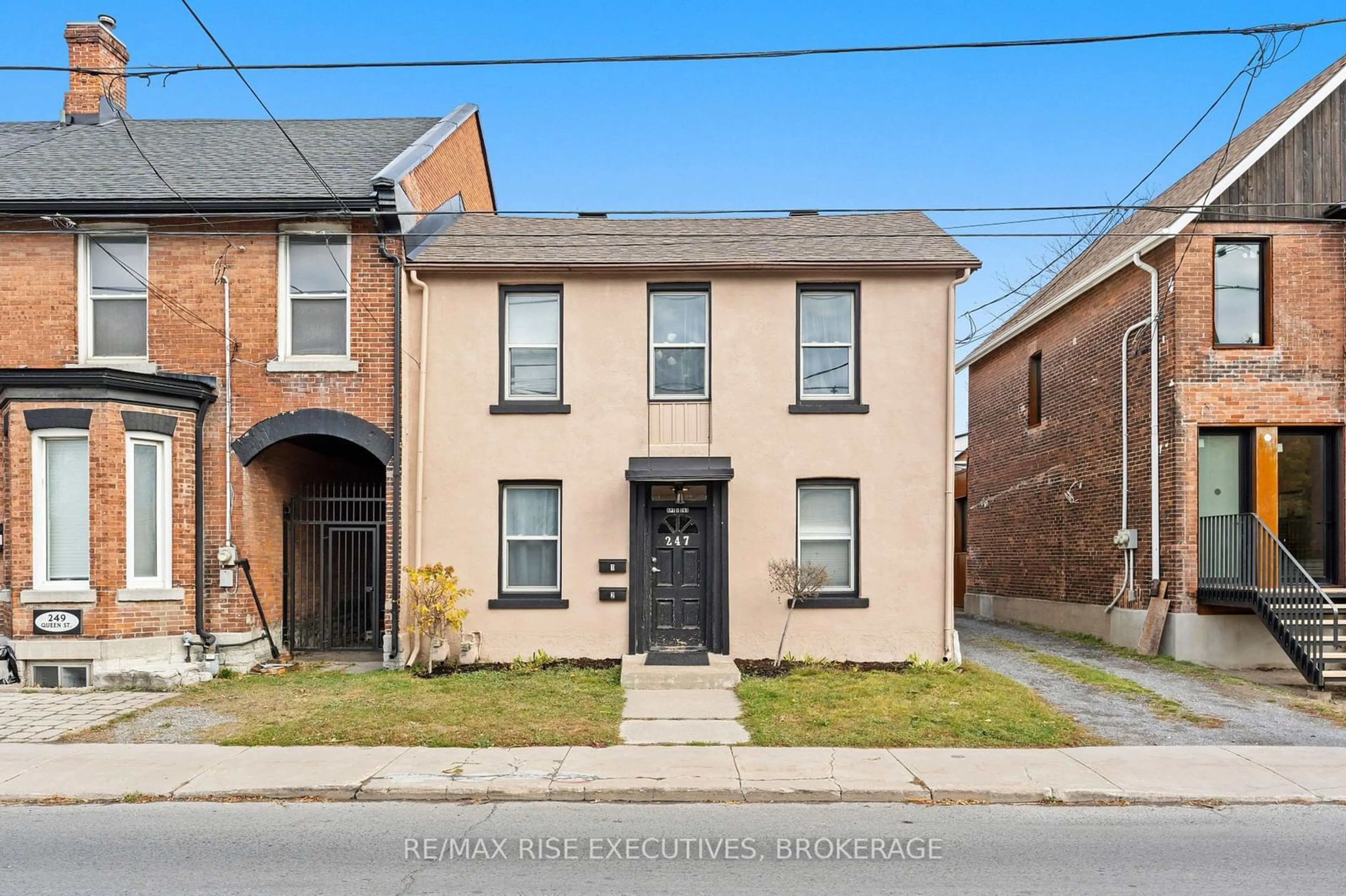 Home with brick exterior material for 247 Queen St, Kingston Ontario K7K 1B5