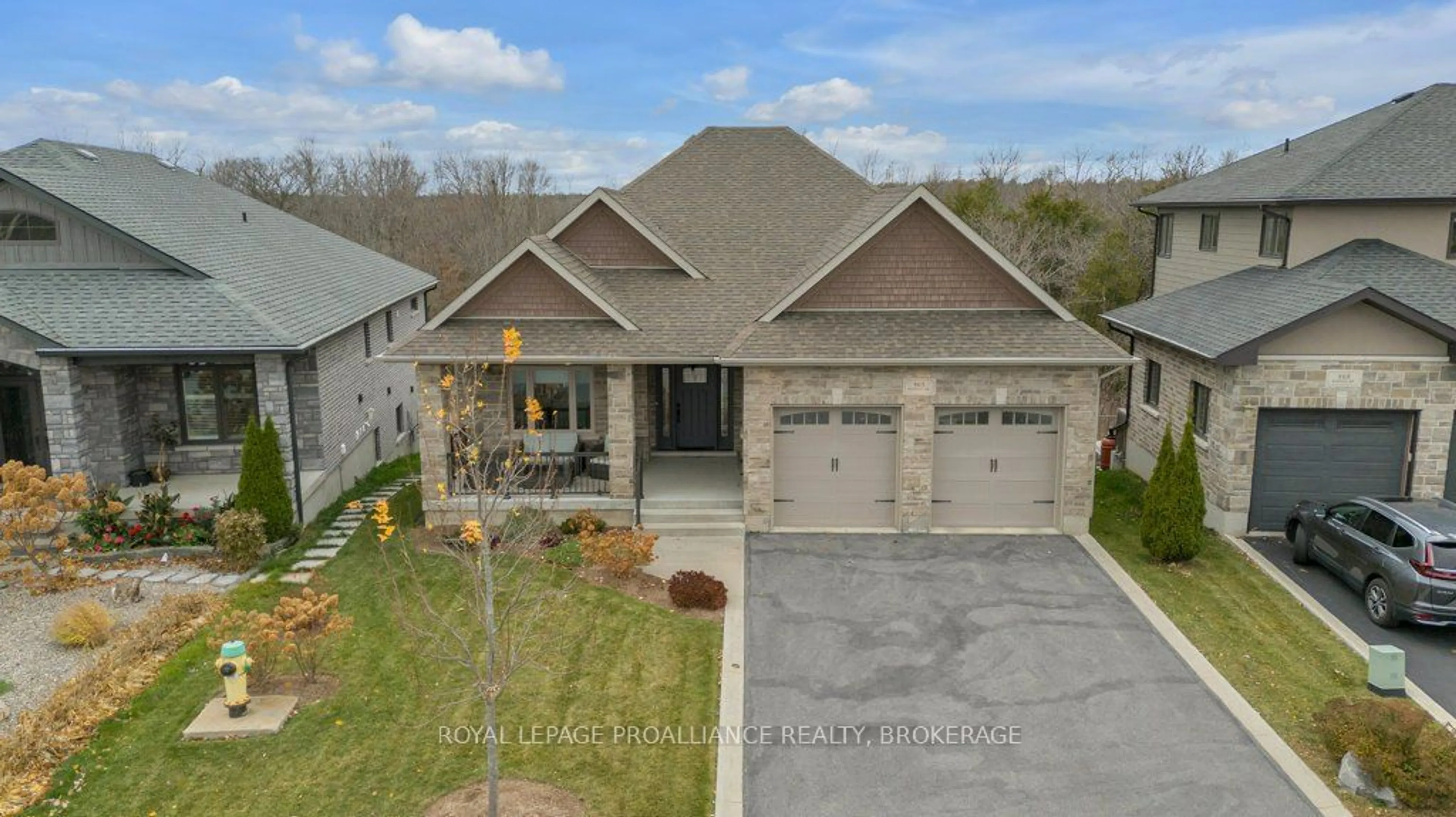 Frontside or backside of a home, the street view for 865 Roshan Dr, Kingston Ontario K7P 0B2