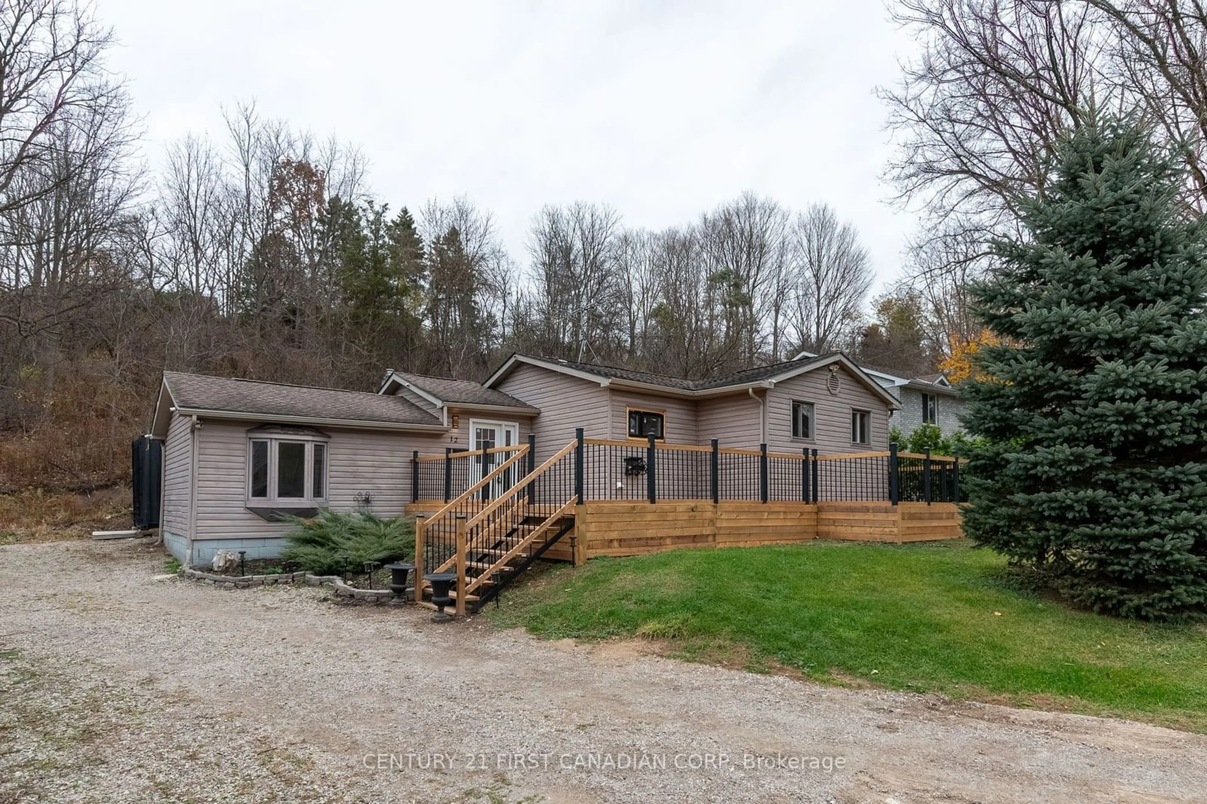 Frontside or backside of a home, cottage for 12 Davis St, Central Elgin Ontario N5P 1X8