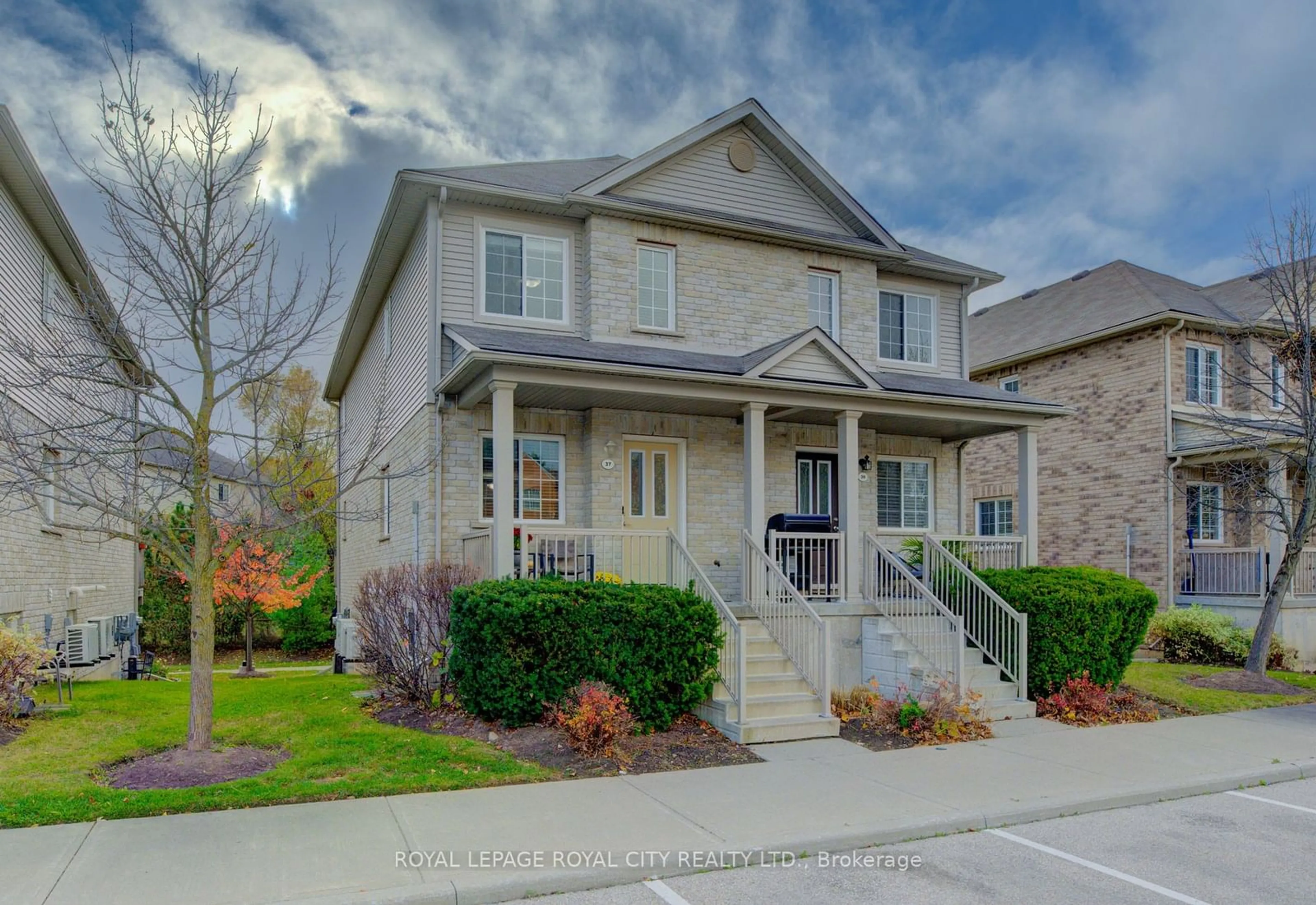 A pic from exterior of the house or condo, the street view for 35 Mountford Dr #37, Guelph Ontario N1E 0G6