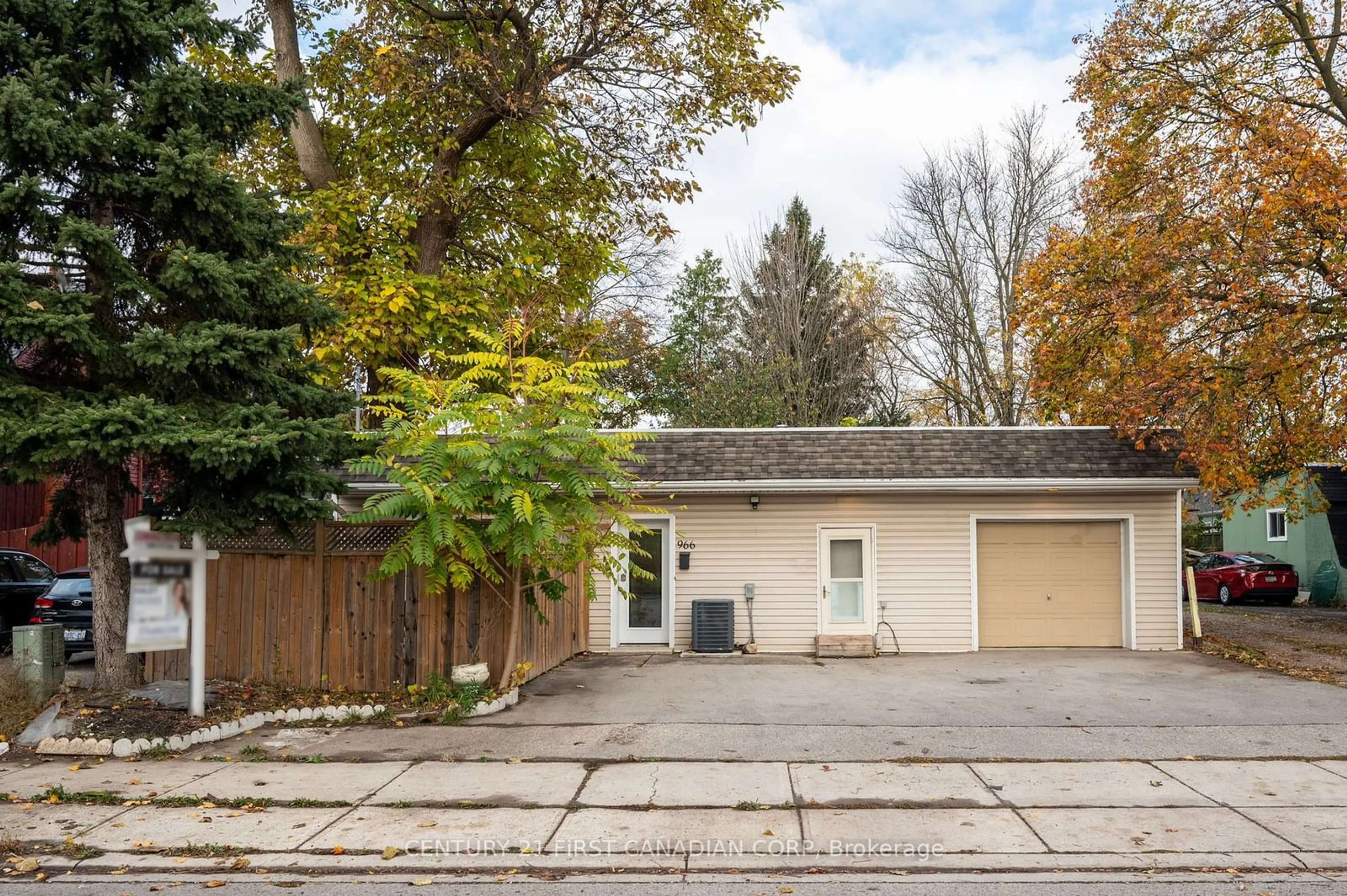 A pic from exterior of the house or condo, the fenced backyard for 966 Princess Ave, London Ontario N5W 3M8