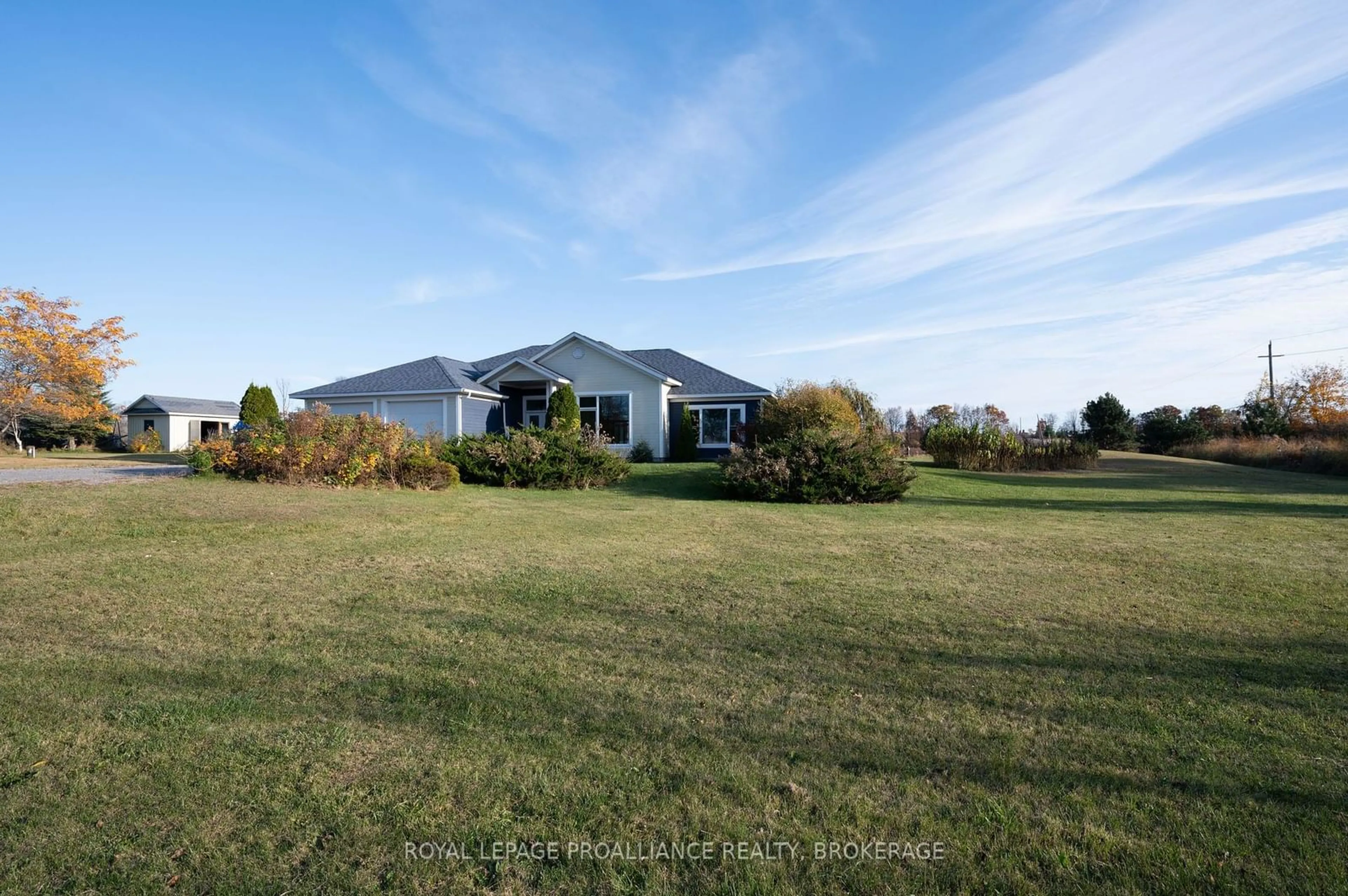 Frontside or backside of a home, the fenced backyard for 10 North Shore Rd, Frontenac Islands Ontario K7G 2V6