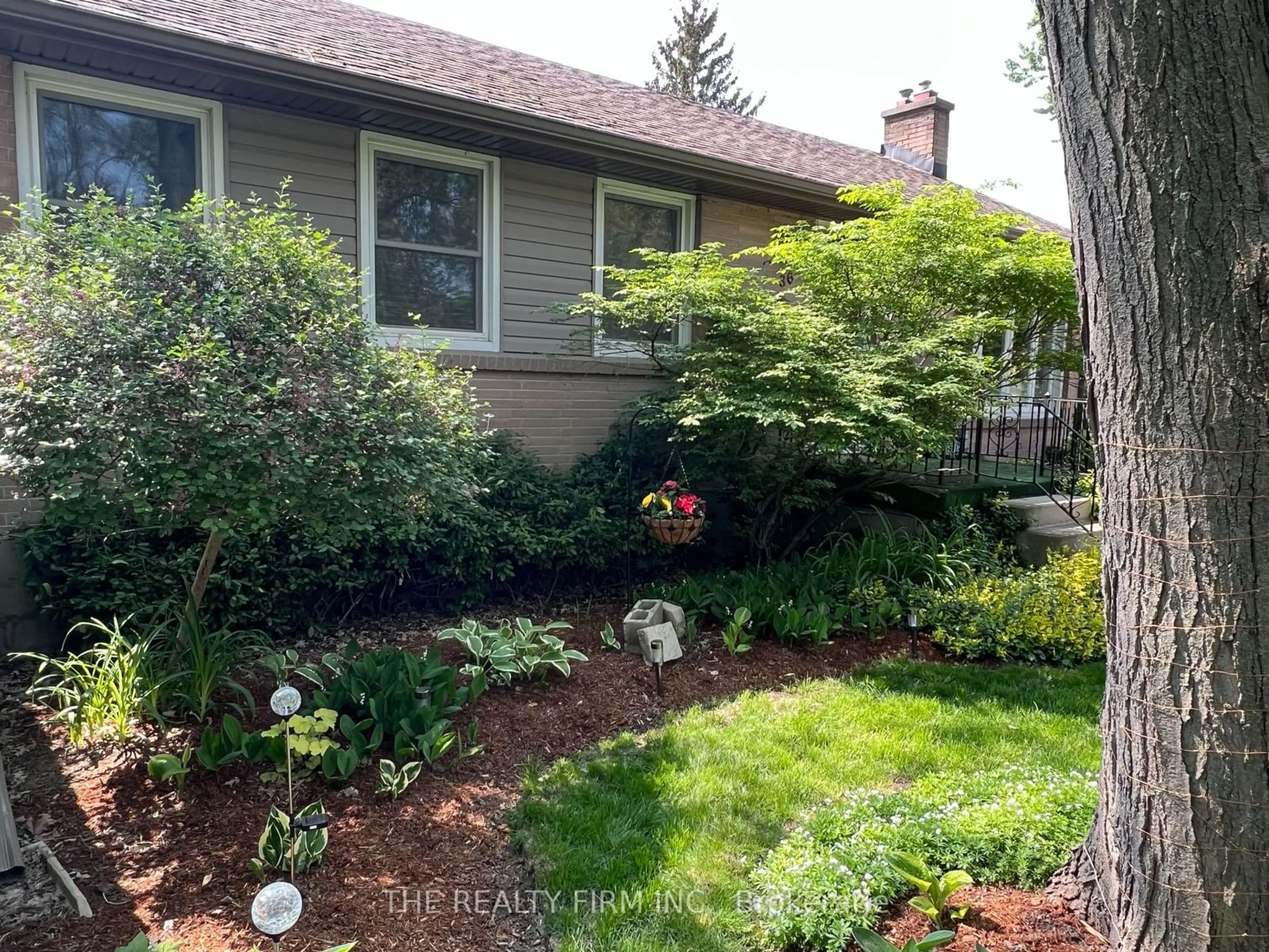 Frontside or backside of a home, the fenced backyard for 36 Dunkirk Pl, London Ontario N6C 2G5