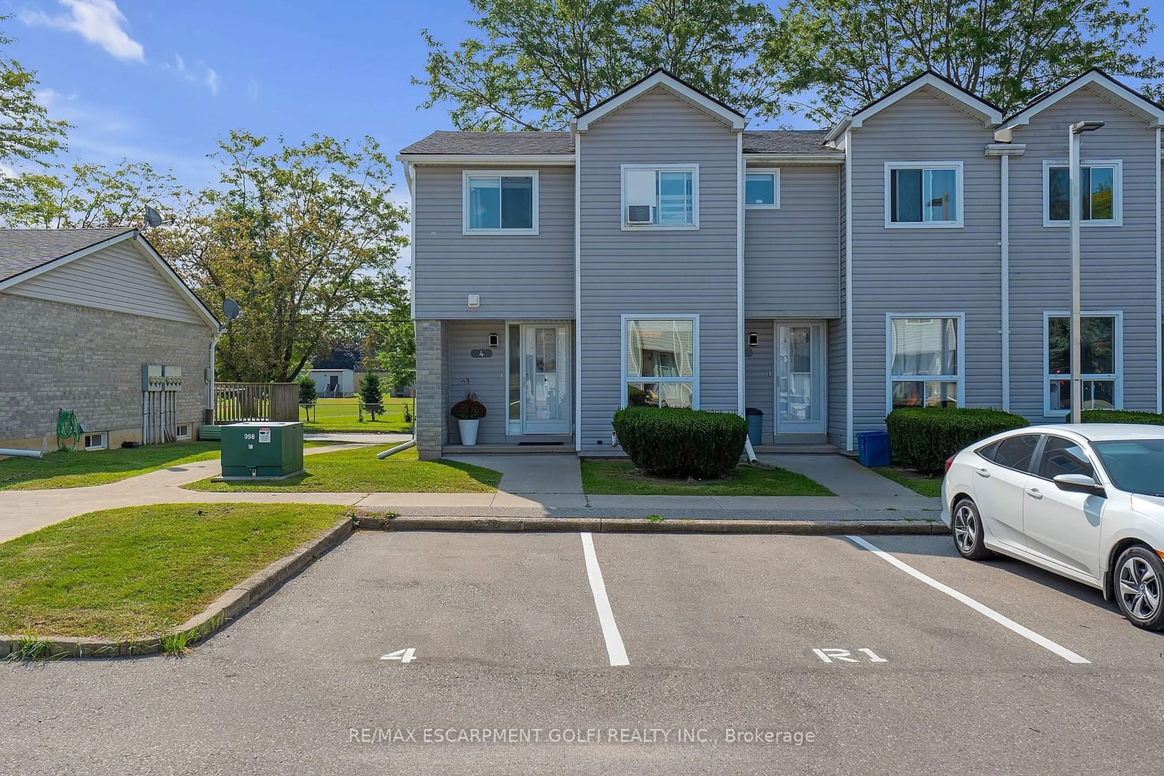 A pic from exterior of the house or condo, the street view for 476 Grey St #4, Brantford Ontario N3S 7S5