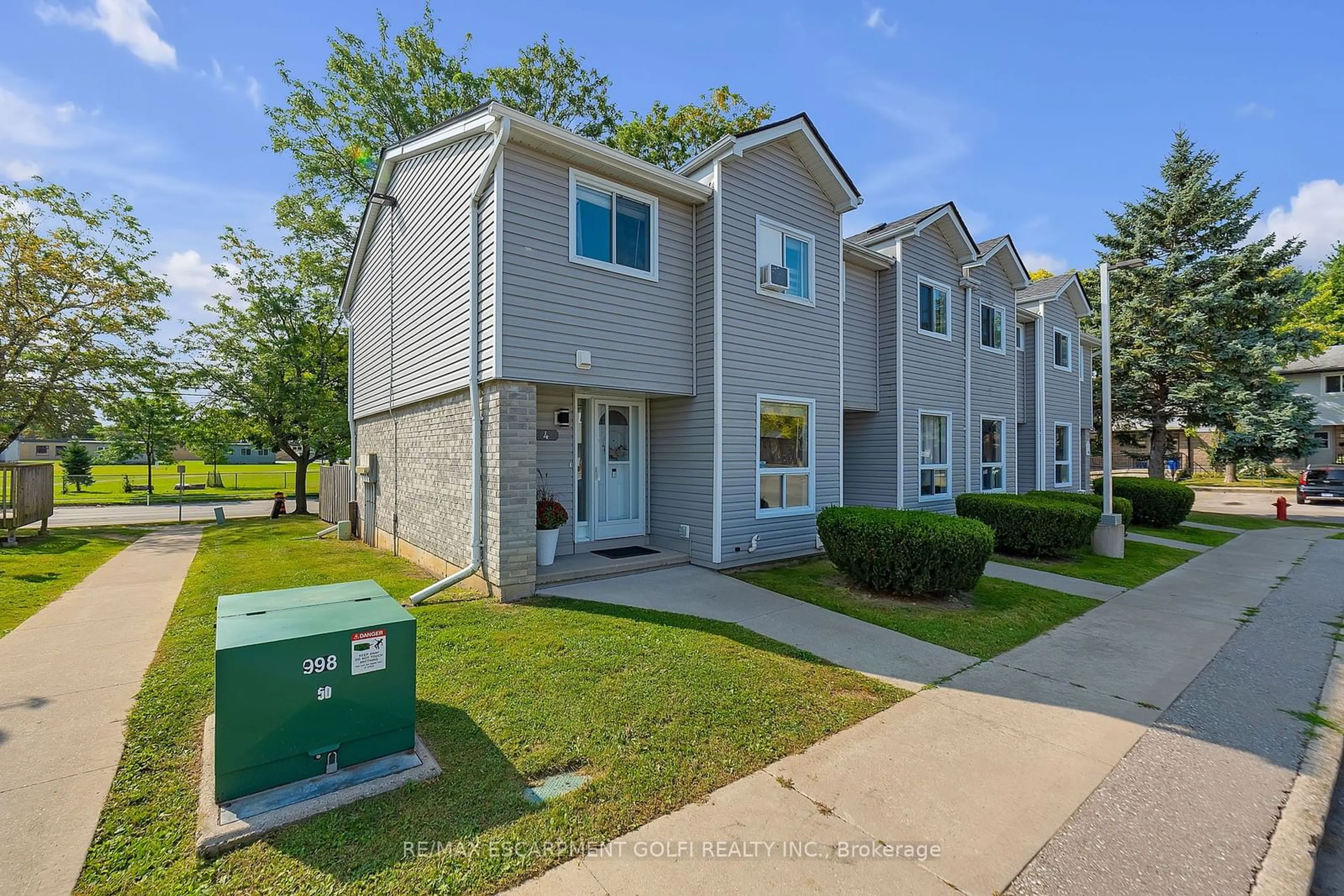 A pic from exterior of the house or condo, the street view for 476 Grey St #4, Brantford Ontario N3S 7S5