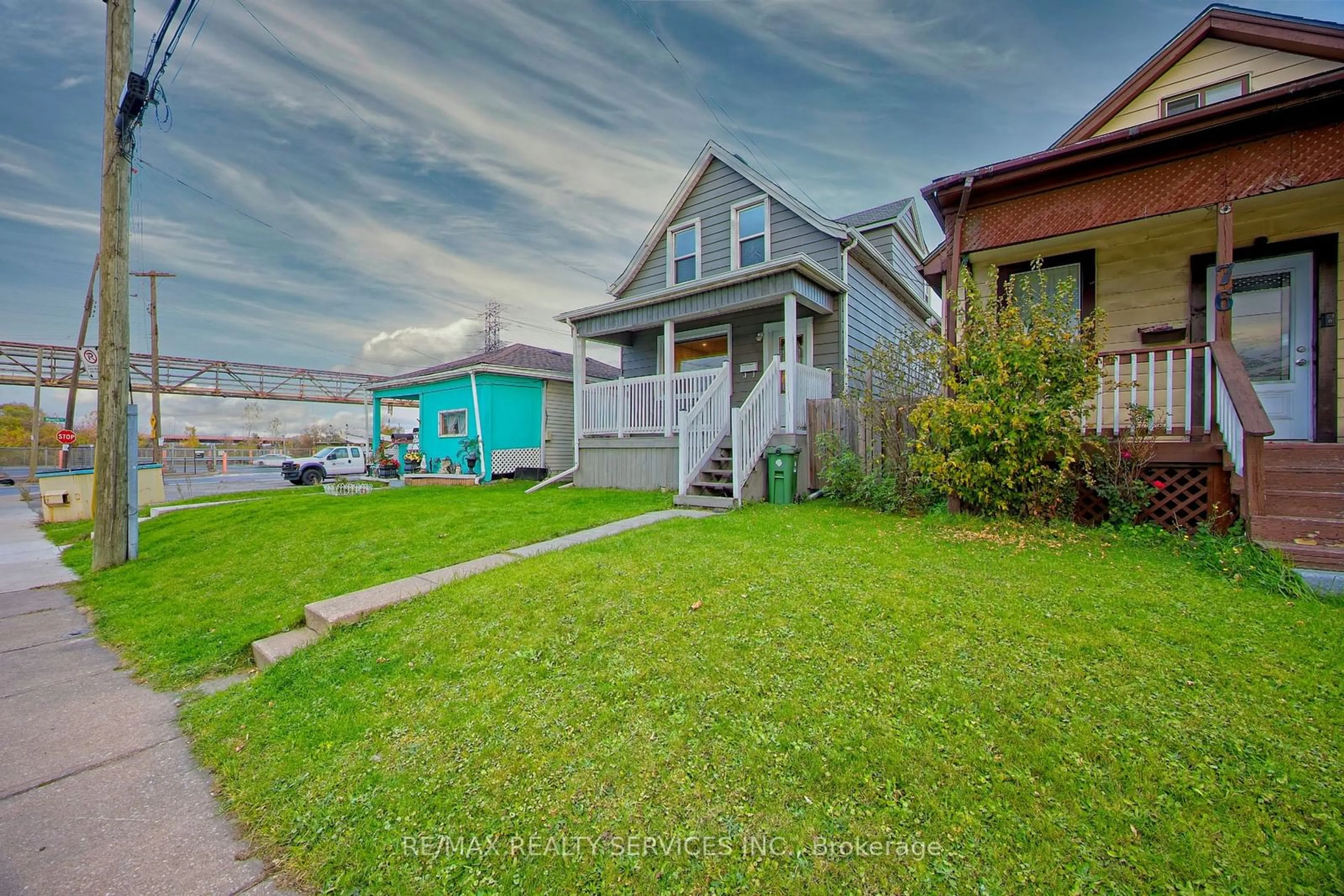 Frontside or backside of a home, the fenced backyard for 78 Martimas Ave, Hamilton Ontario L8H 3N3