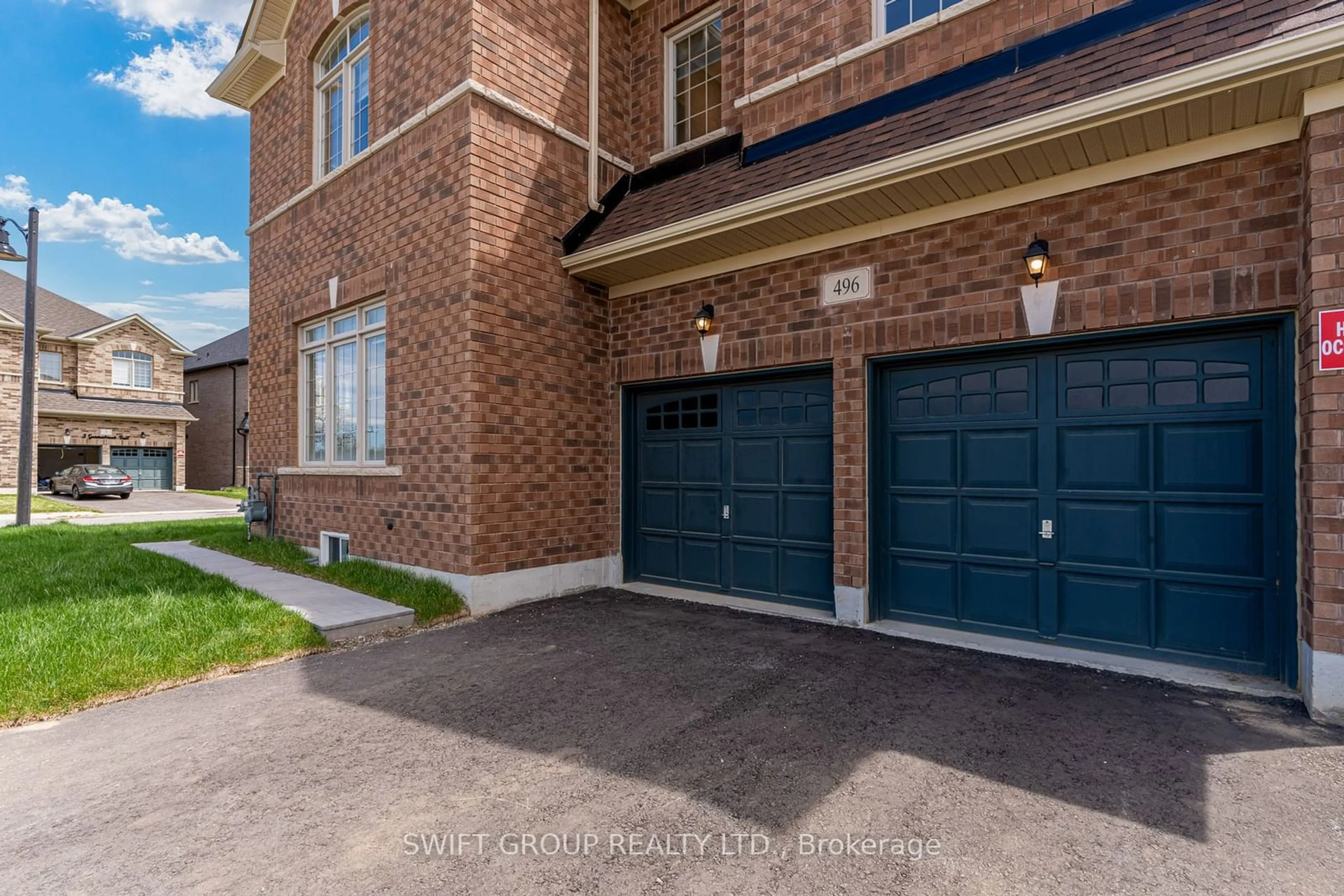 Home with brick exterior material for 496 Skinner Rd, Hamilton Ontario L8B 1Z9