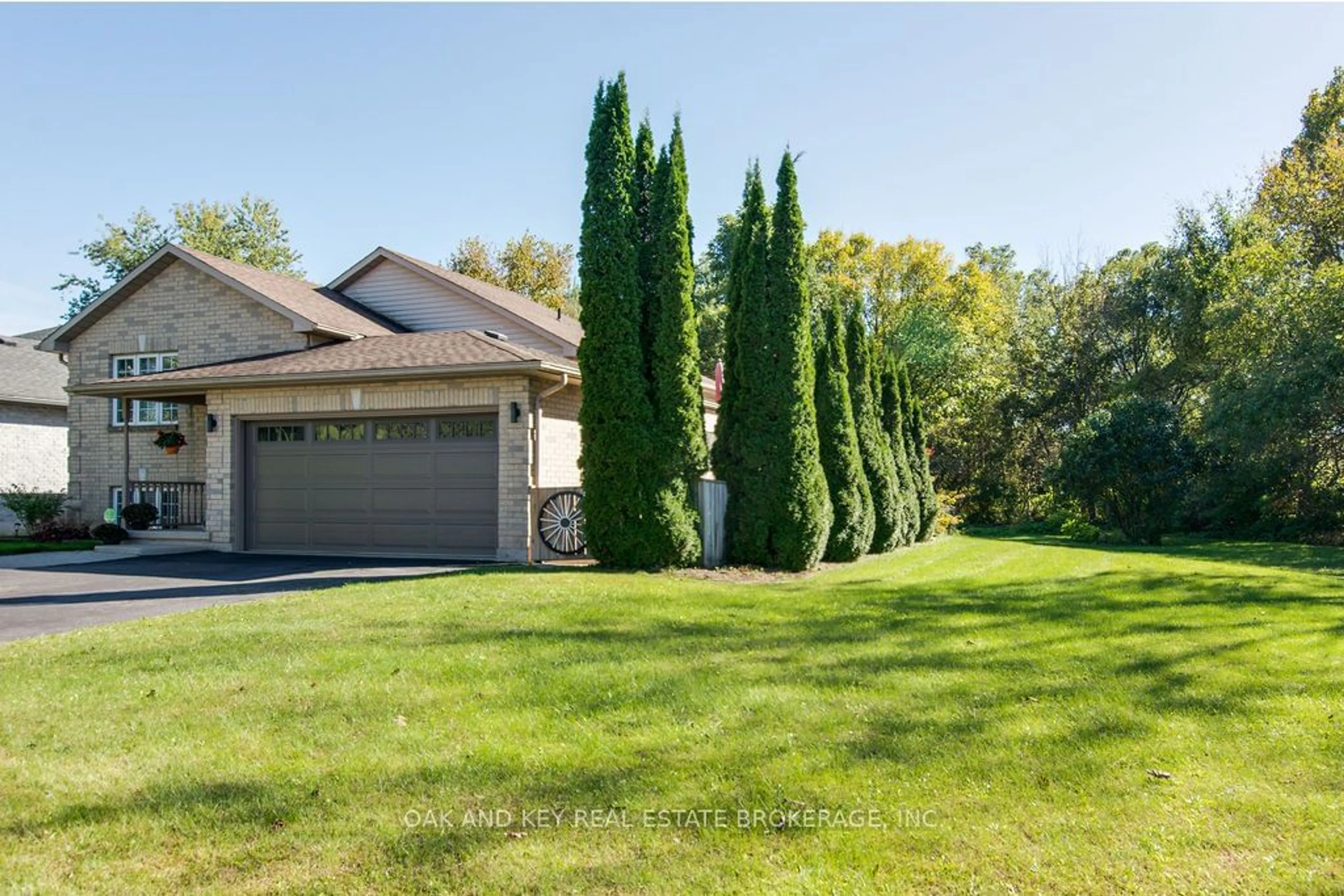 A pic from exterior of the house or condo, the fenced backyard for 11 Beech Blvd, Tillsonburg Ontario N4G 5R7