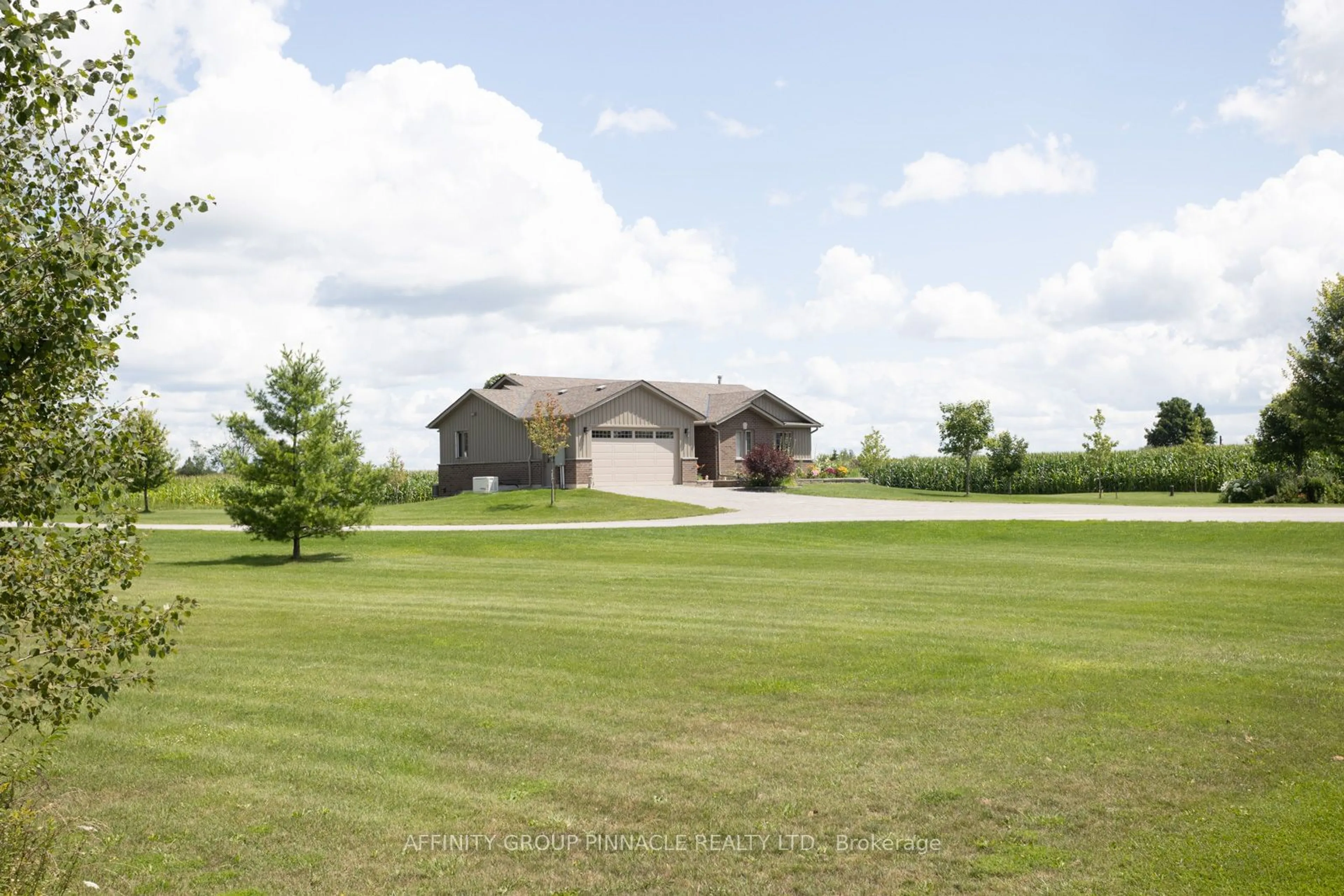 Frontside or backside of a home, the fenced backyard for 654 White Rock Rd, Kawartha Lakes Ontario K0M 2M0