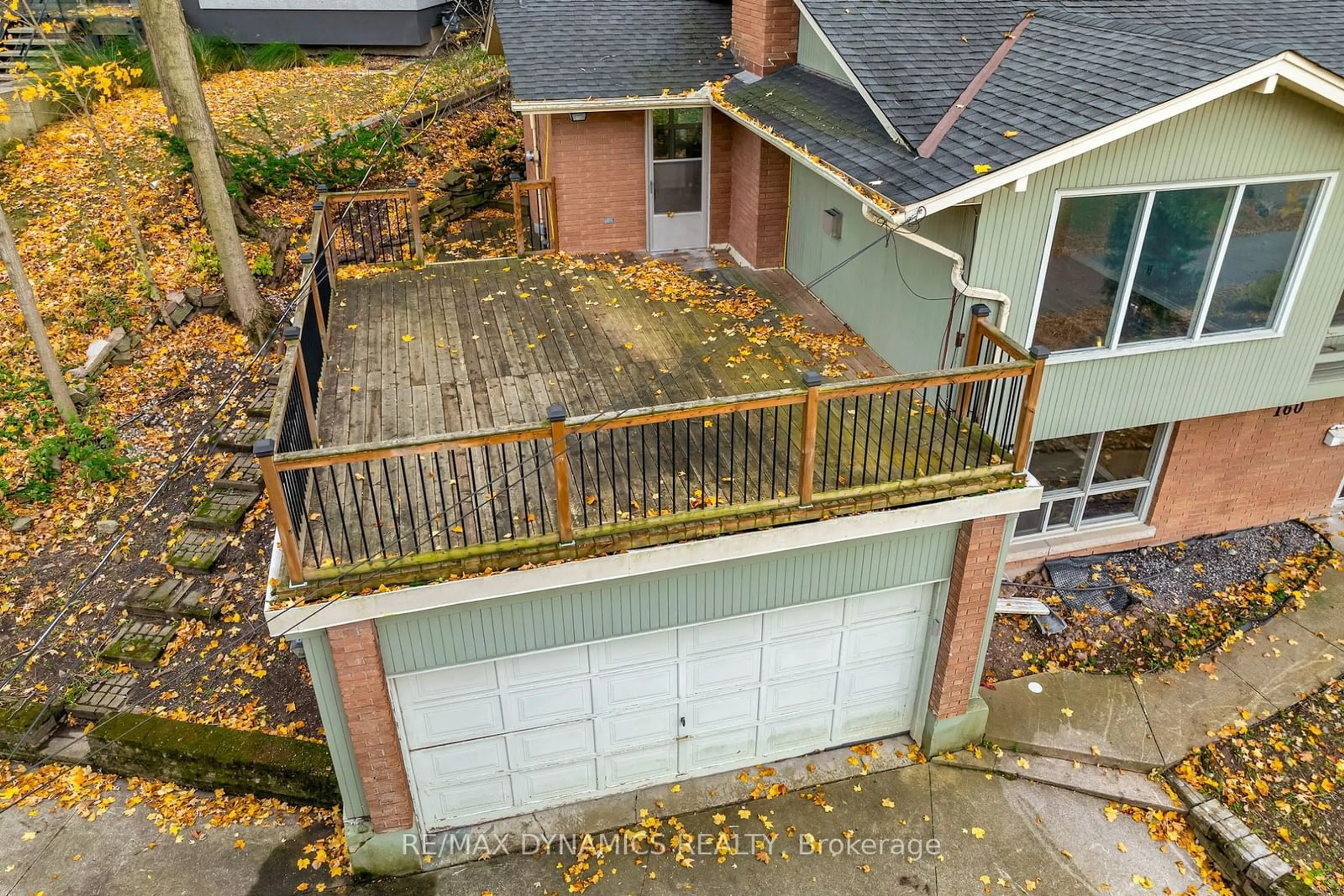 Frontside or backside of a home, the fenced backyard for 160 Woodside Dr, St. Catharines Ontario L2T 1X2