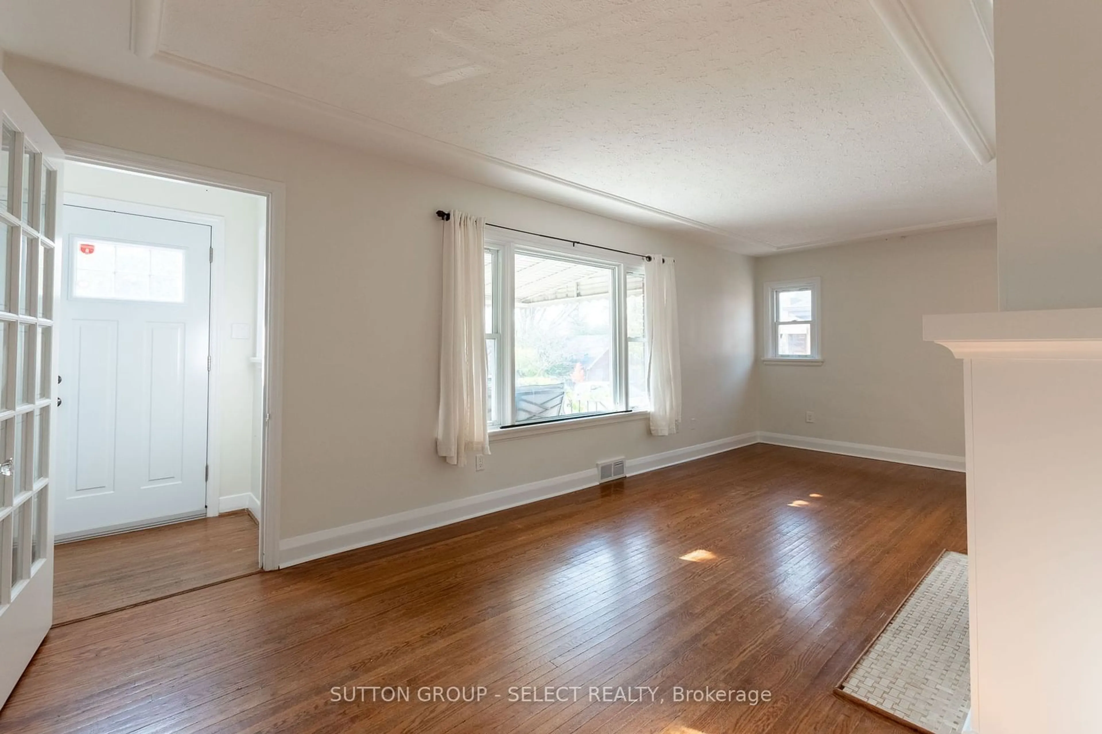 A pic of a room, wood floors for 618 St James St, London Ontario N5Y 3P8