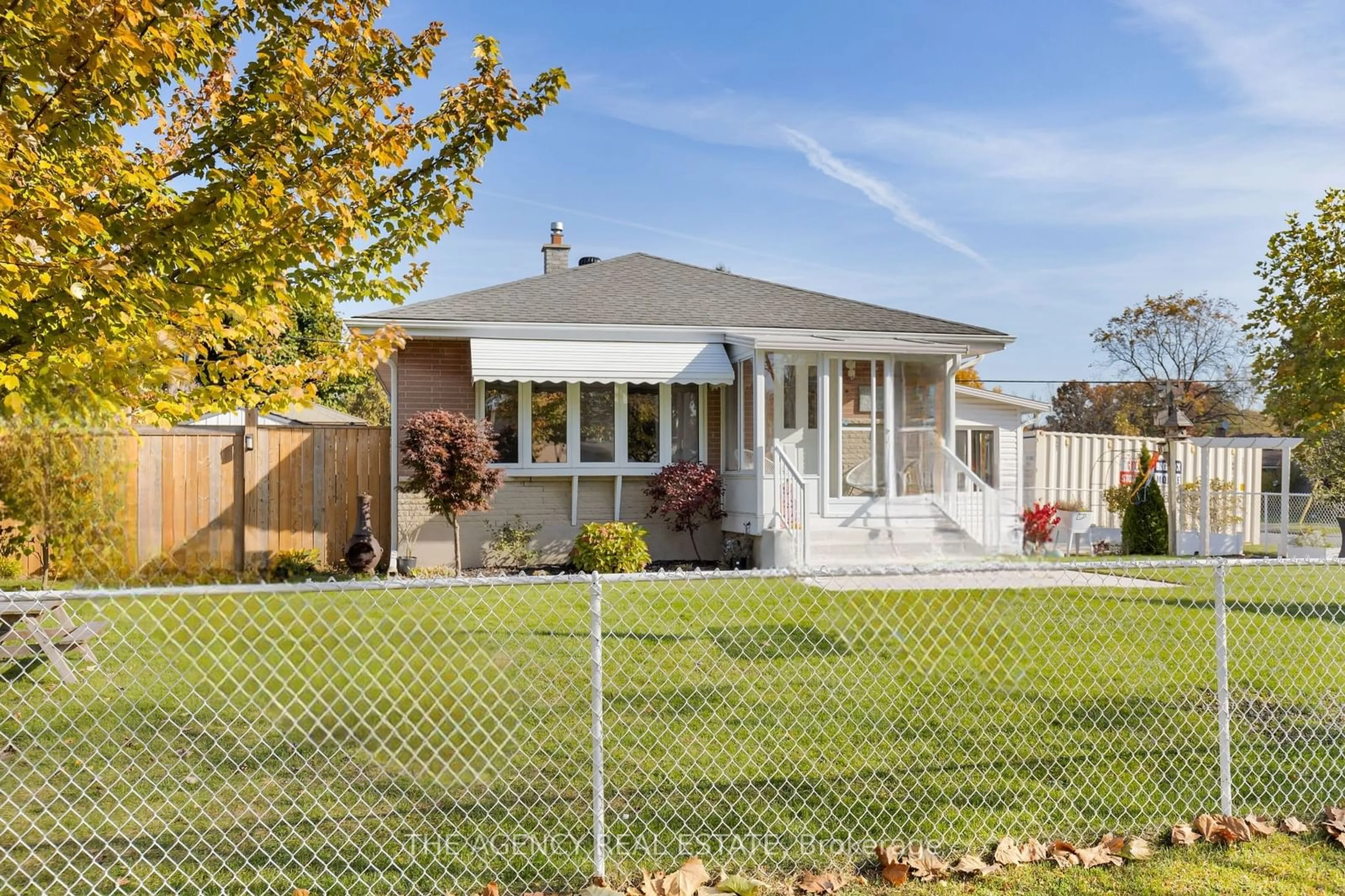 Frontside or backside of a home, the fenced backyard for 260 Tweedsmuir Ave, London Ontario N5W 1L3