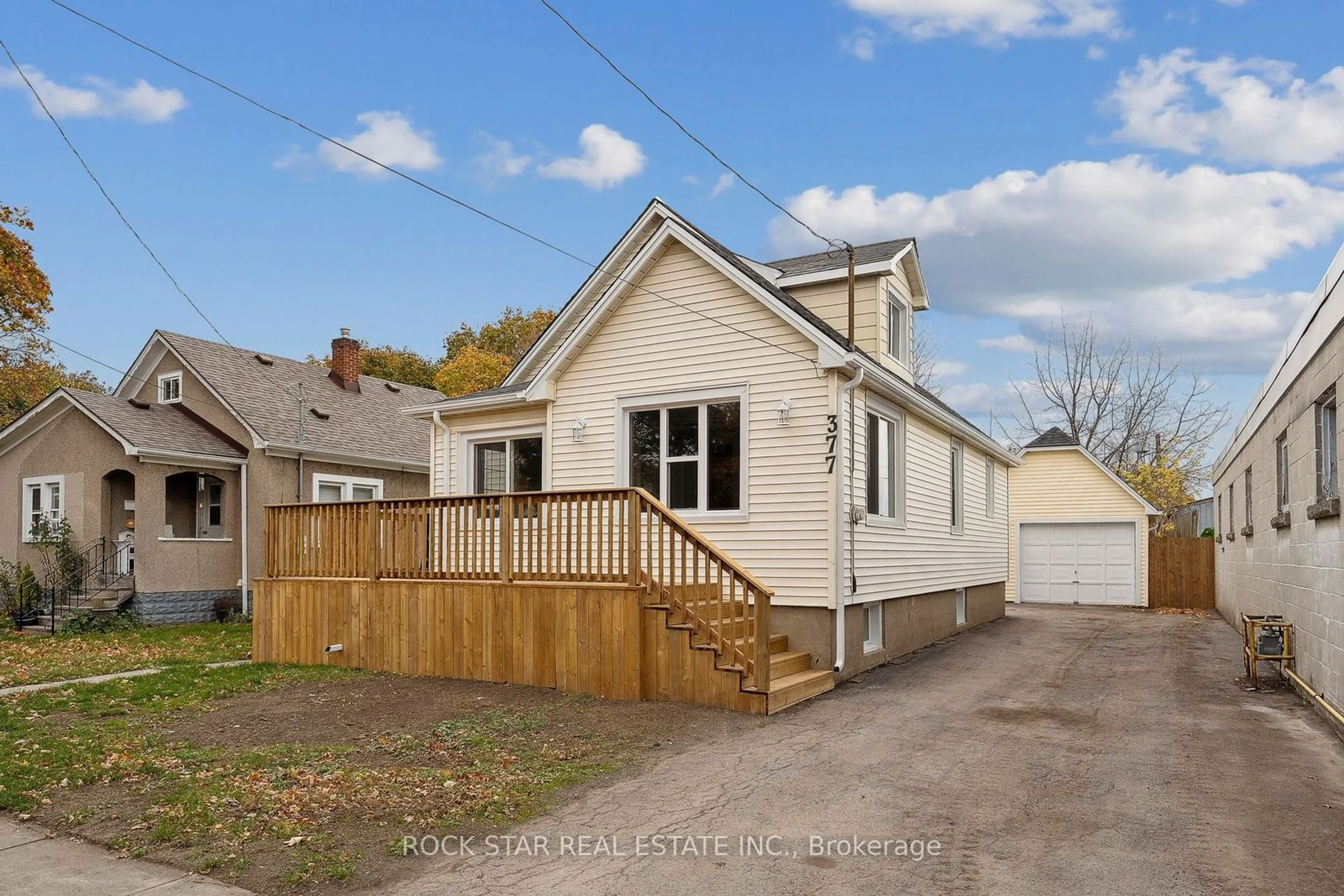 Frontside or backside of a home, the fenced backyard for 377 Davis St, Port Colborne Ontario L3K 1Z5