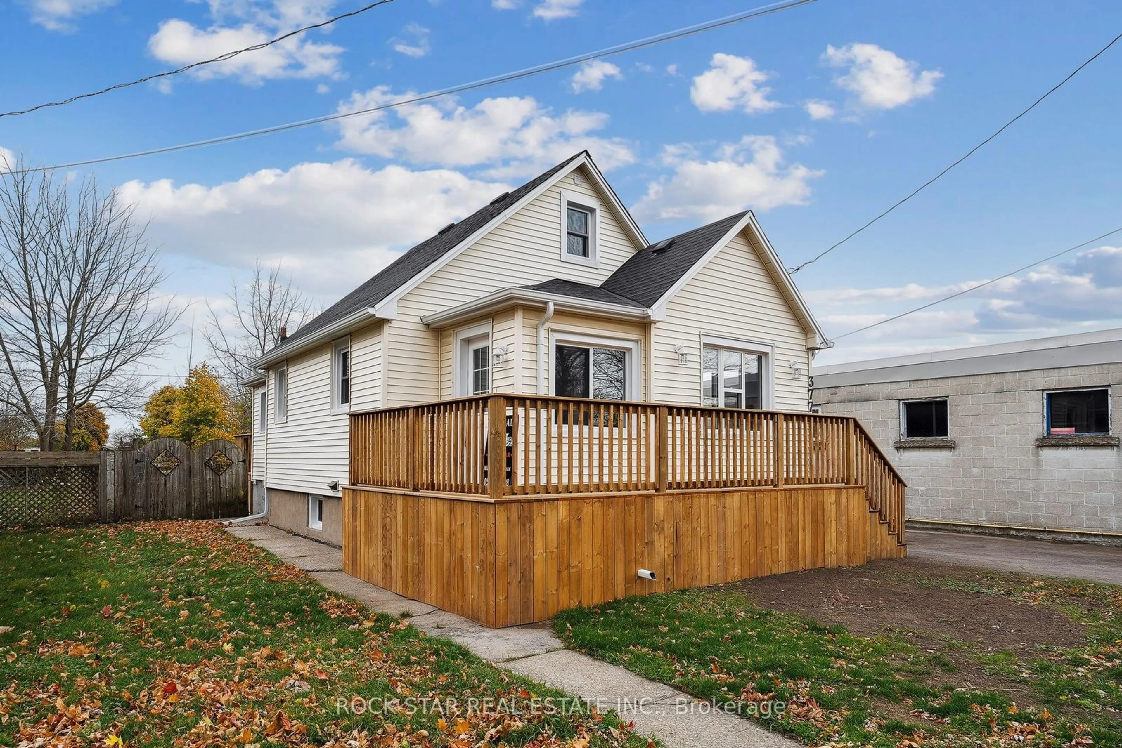 Frontside or backside of a home, the fenced backyard for 377 Davis St, Port Colborne Ontario L3K 1Z5