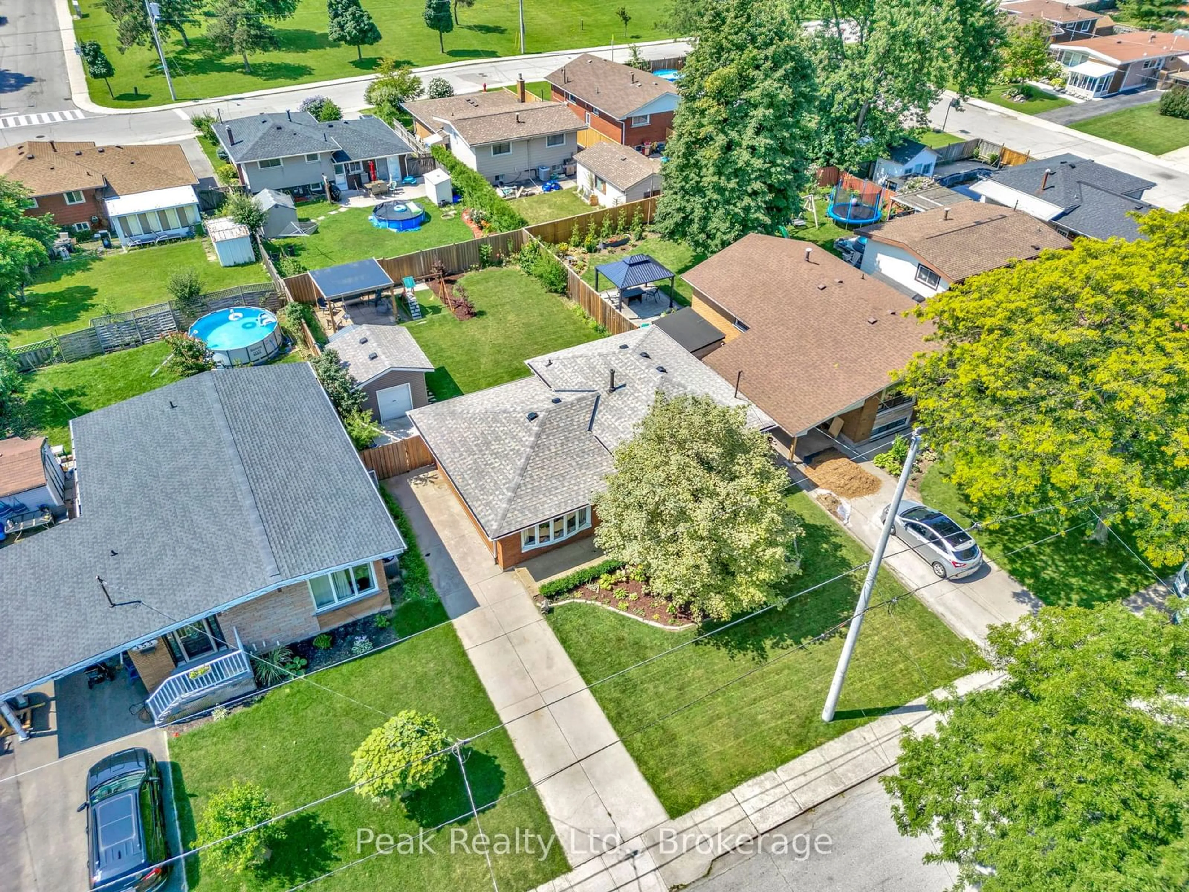 Frontside or backside of a home, the fenced backyard for 157 Fielding Cres, Hamilton Ontario L8V 2P7