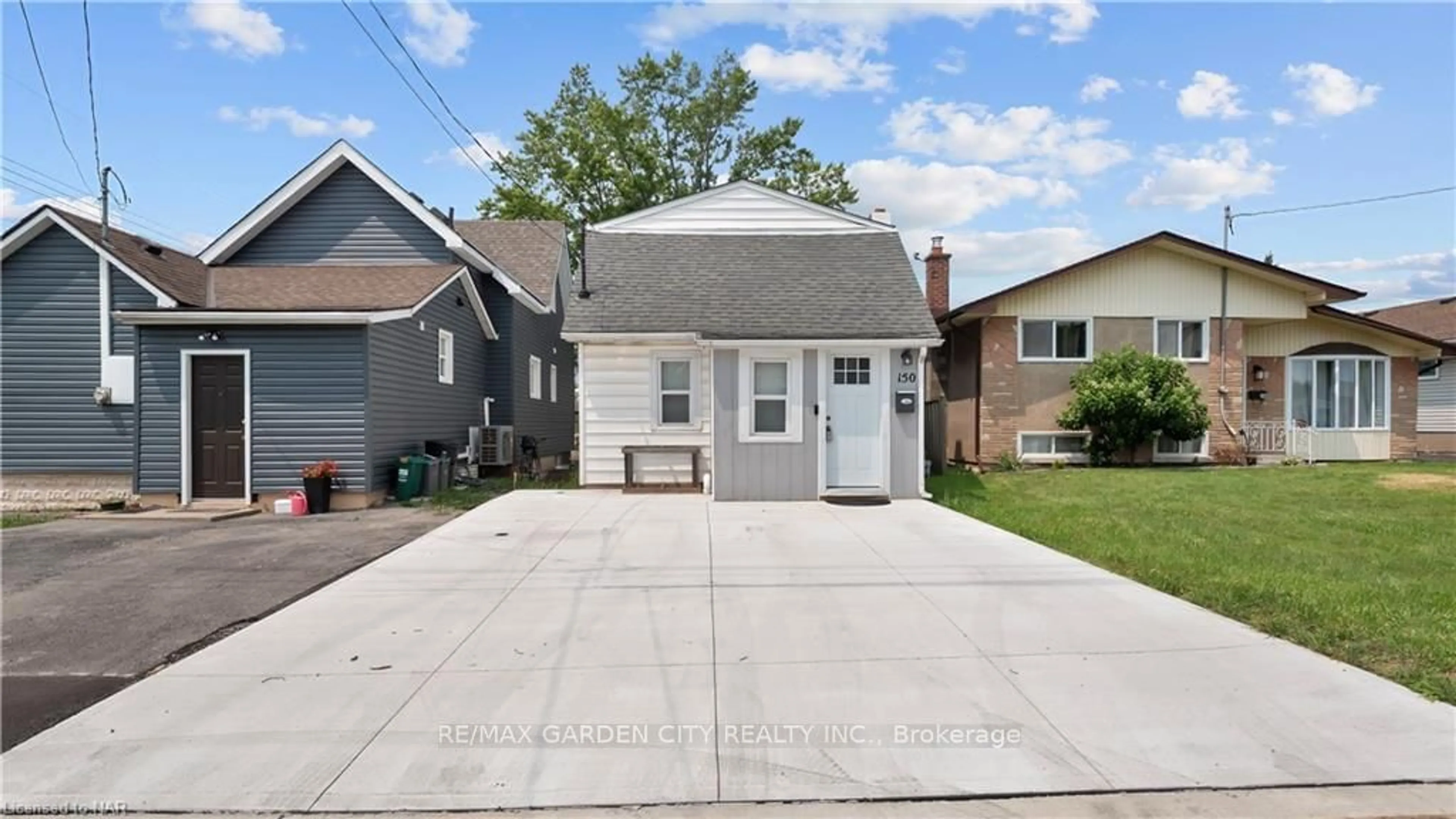 Frontside or backside of a home, the fenced backyard for 150 Iva St, Welland Ontario L3B 1W4