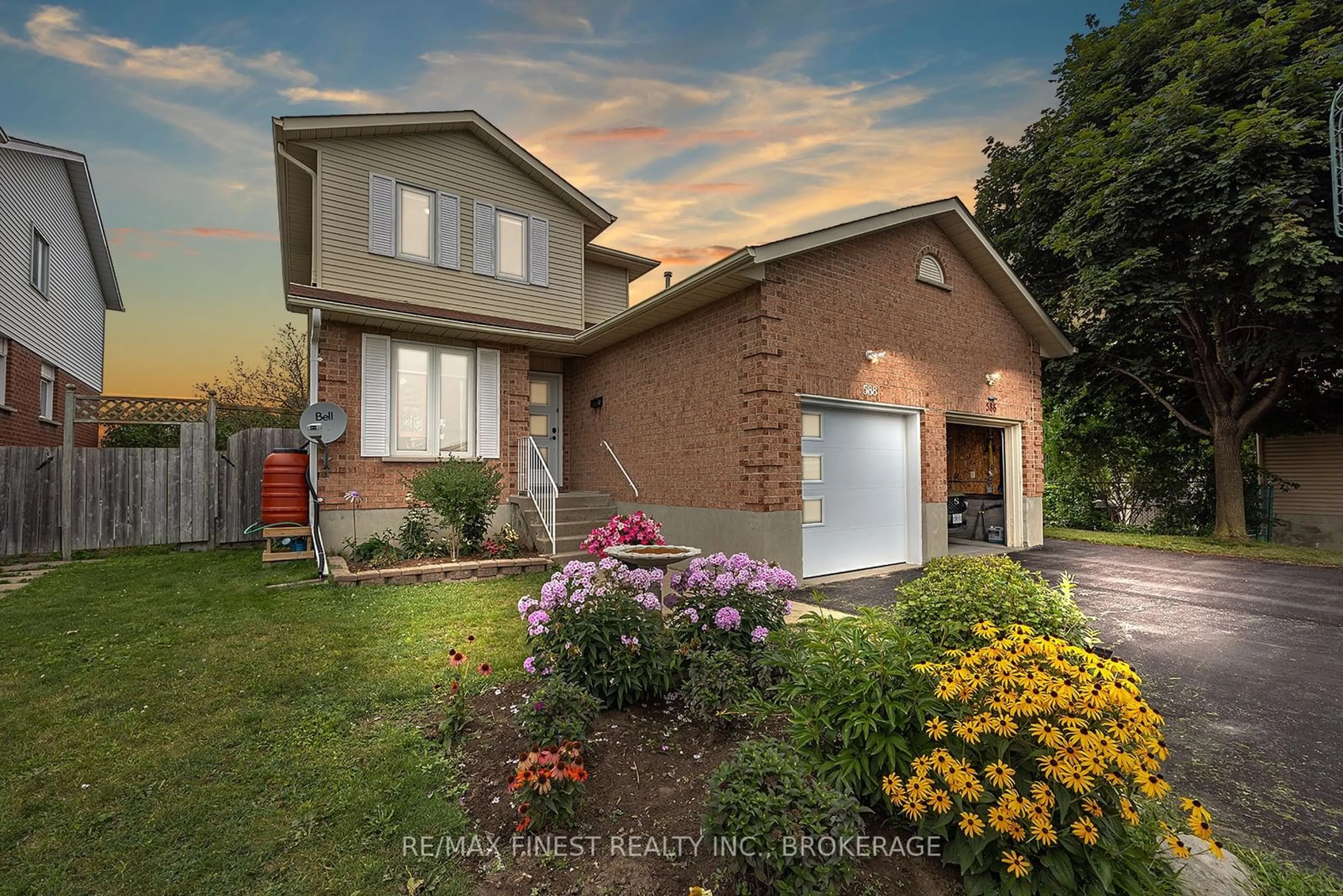 Frontside or backside of a home, the fenced backyard for 588 Whistler Terr, Kingston Ontario K7M 8K4