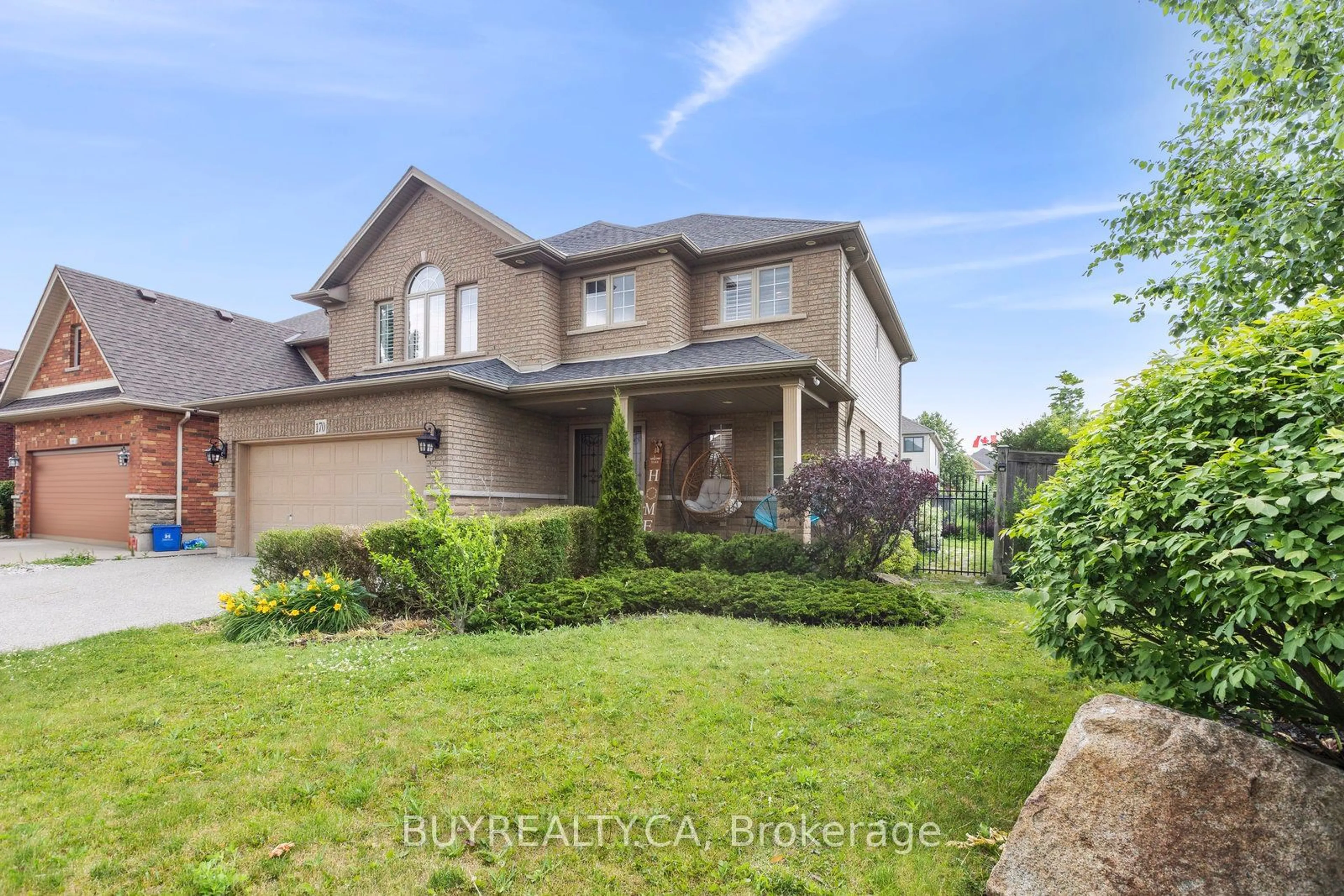 Frontside or backside of a home, the fenced backyard for 170 Southbrook Dr, Hamilton Ontario L0R 1C0