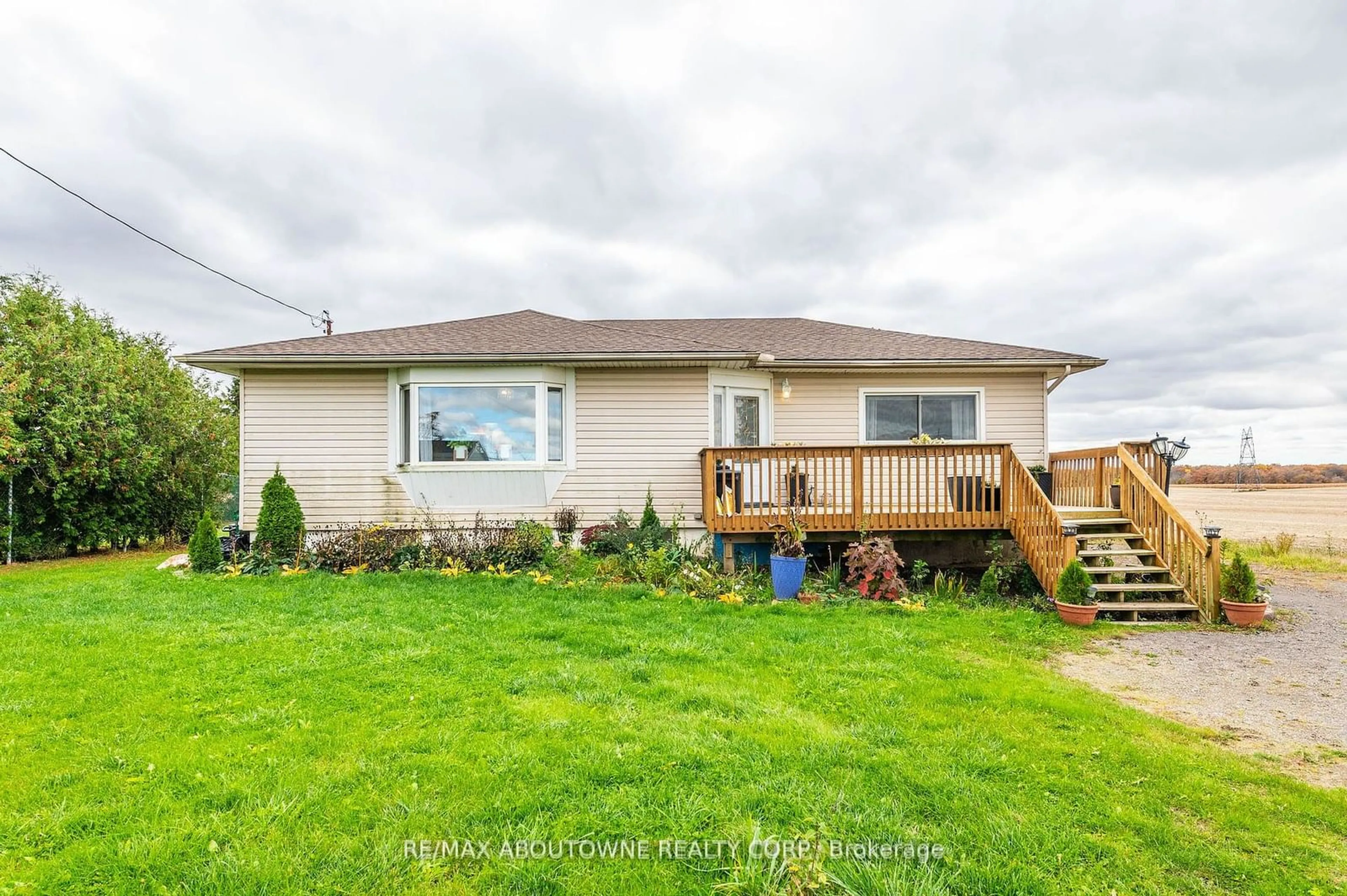 Frontside or backside of a home, the fenced backyard for 9382 Silver St, West Lincoln Ontario L0R 1E0