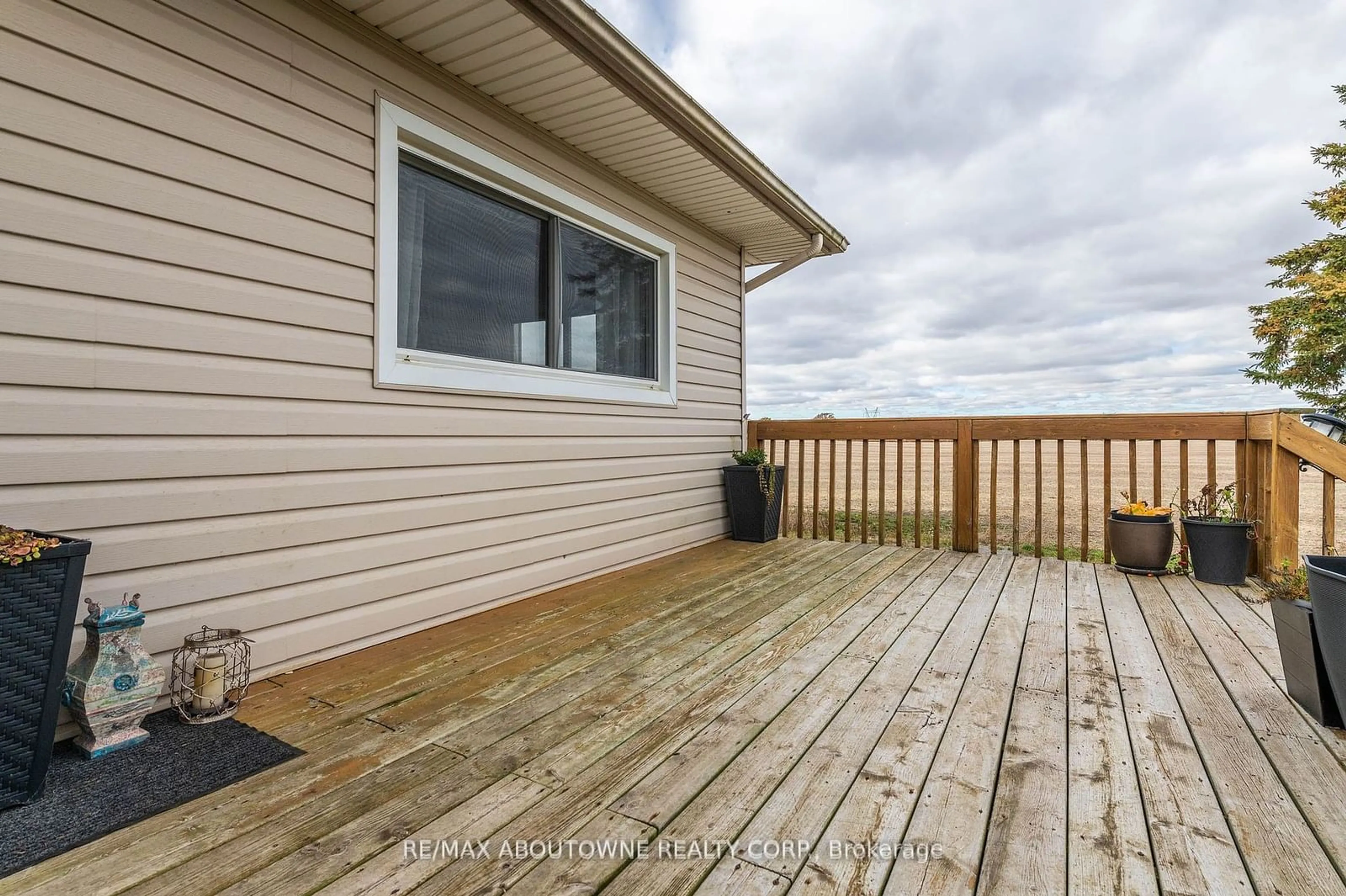 A pic from exterior of the house or condo, the fenced backyard for 9382 Silver St, West Lincoln Ontario L0R 1E0