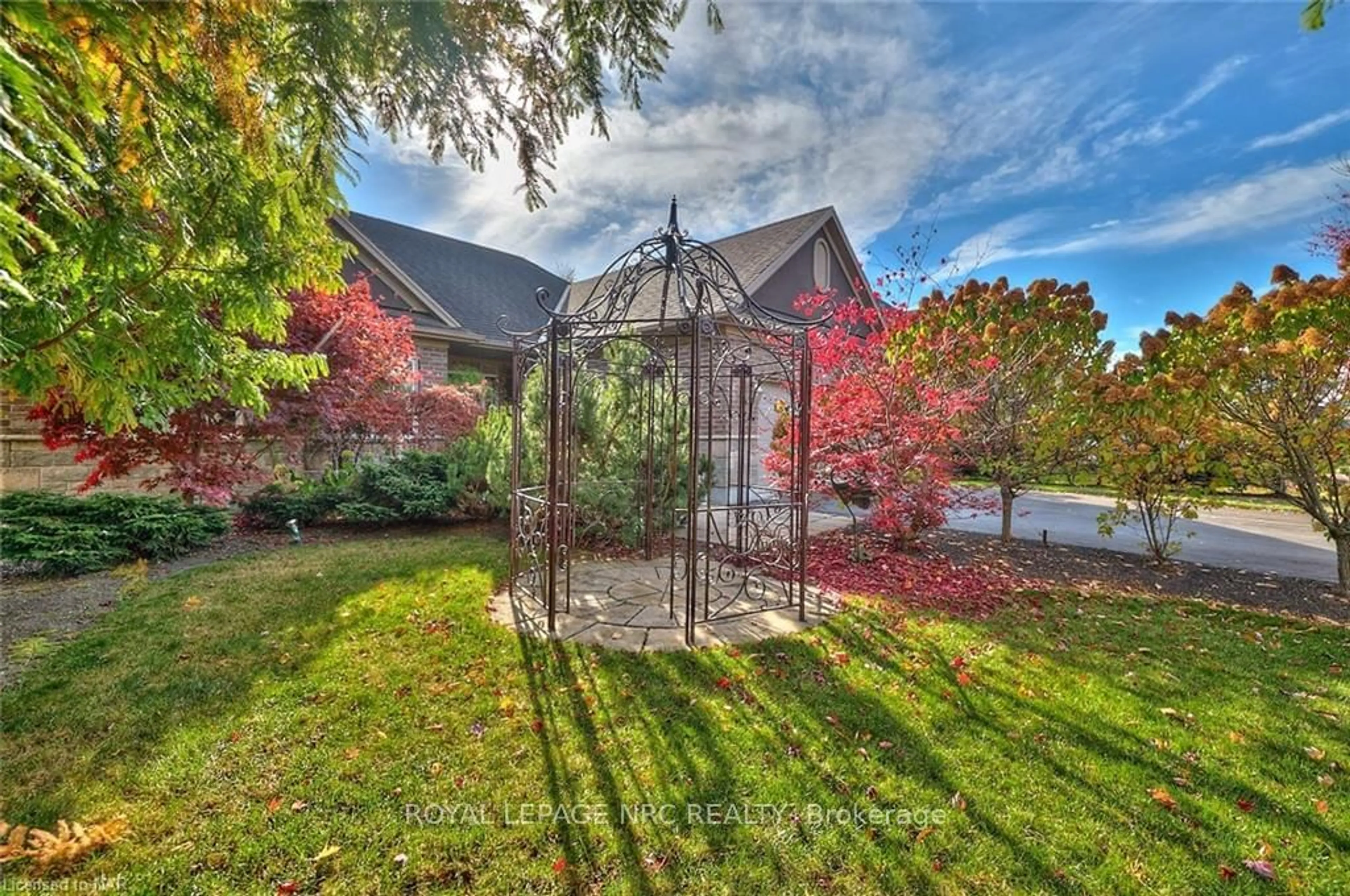 A pic from exterior of the house or condo, the fenced backyard for 18 MARTHA Crt, Pelham Ontario L0S 1C0