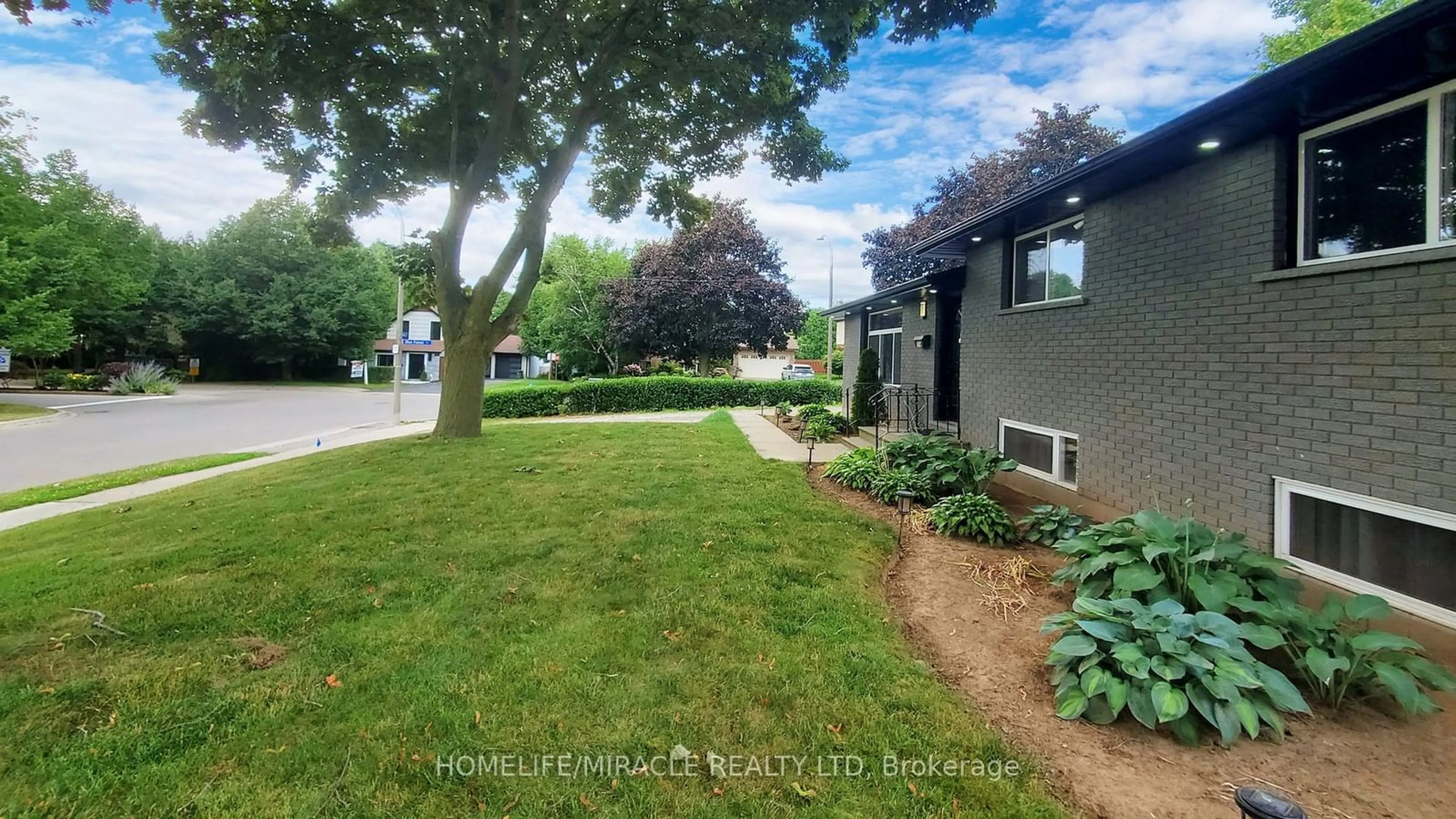 Frontside or backside of a home, the fenced backyard for 374 Book Rd, Grimsby Ontario L3M 2M6