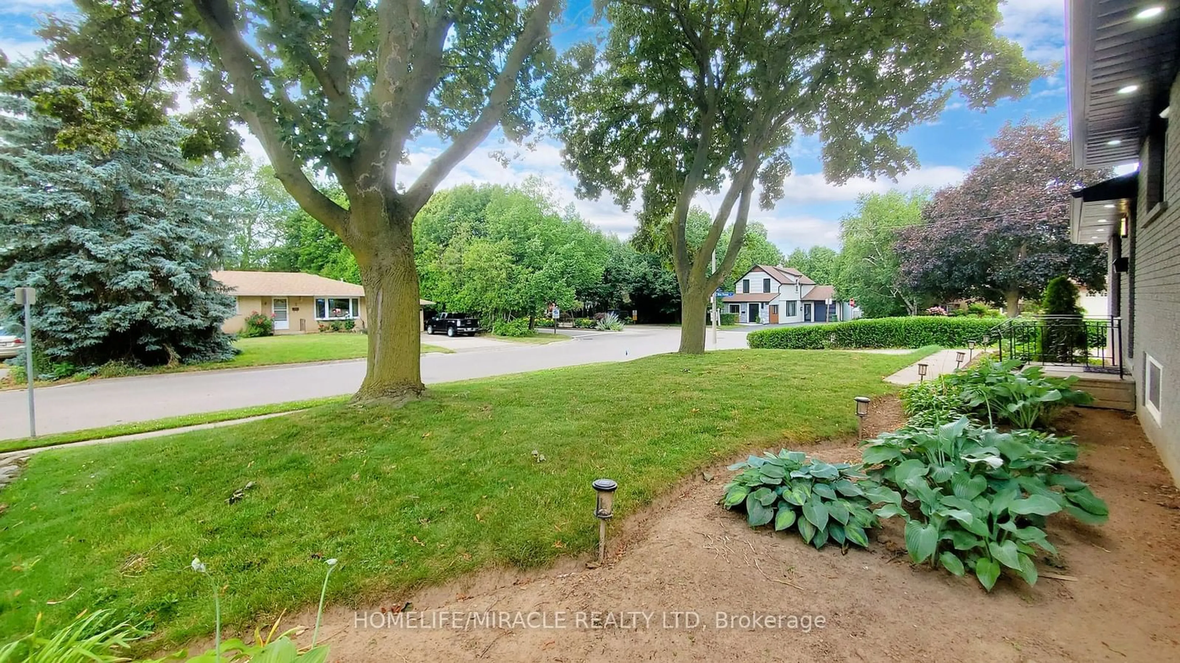 A pic from exterior of the house or condo, the fenced backyard for 374 Book Rd, Grimsby Ontario L3M 2M6