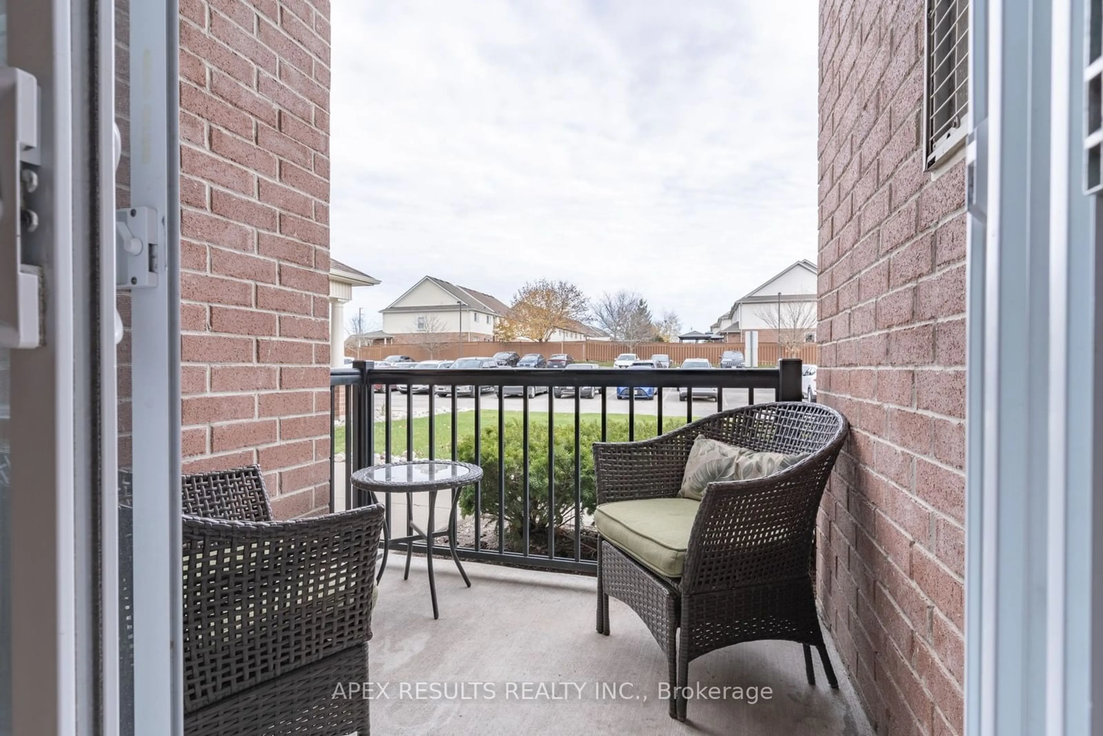 Patio, the fenced backyard for 415 Grange Rd #104, Guelph Ontario N1E 0C4