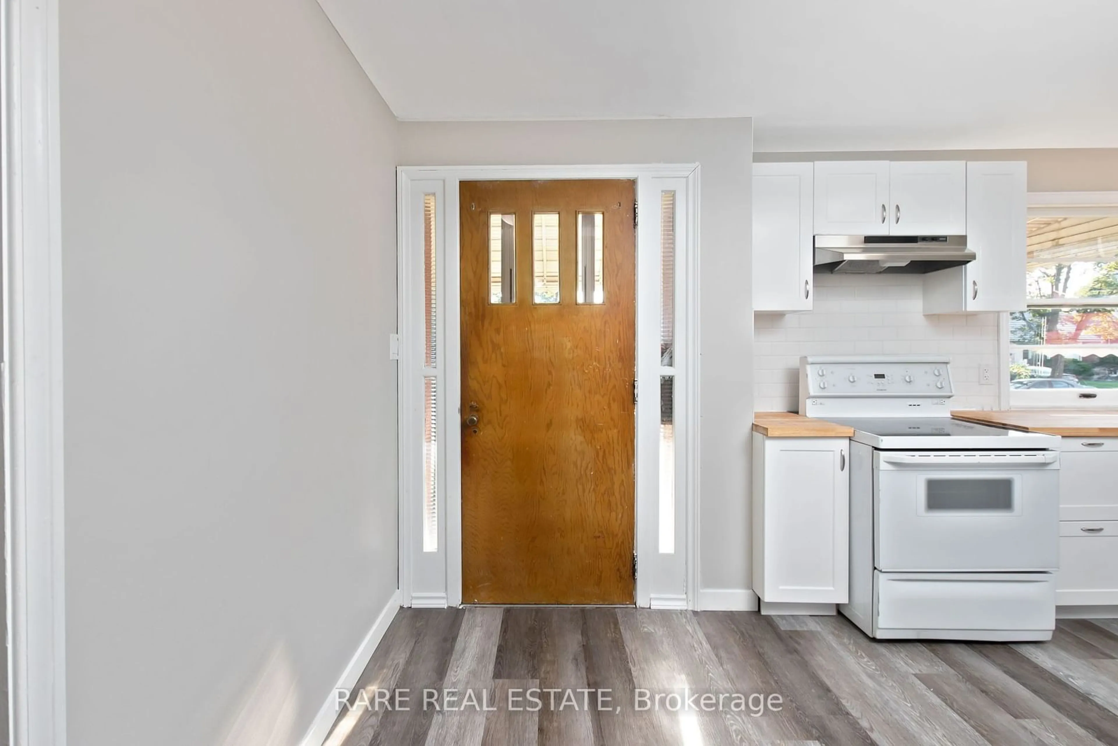 Indoor entryway, wood floors for 1544 Pillette Rd, Windsor Ontario N8Y 3C2