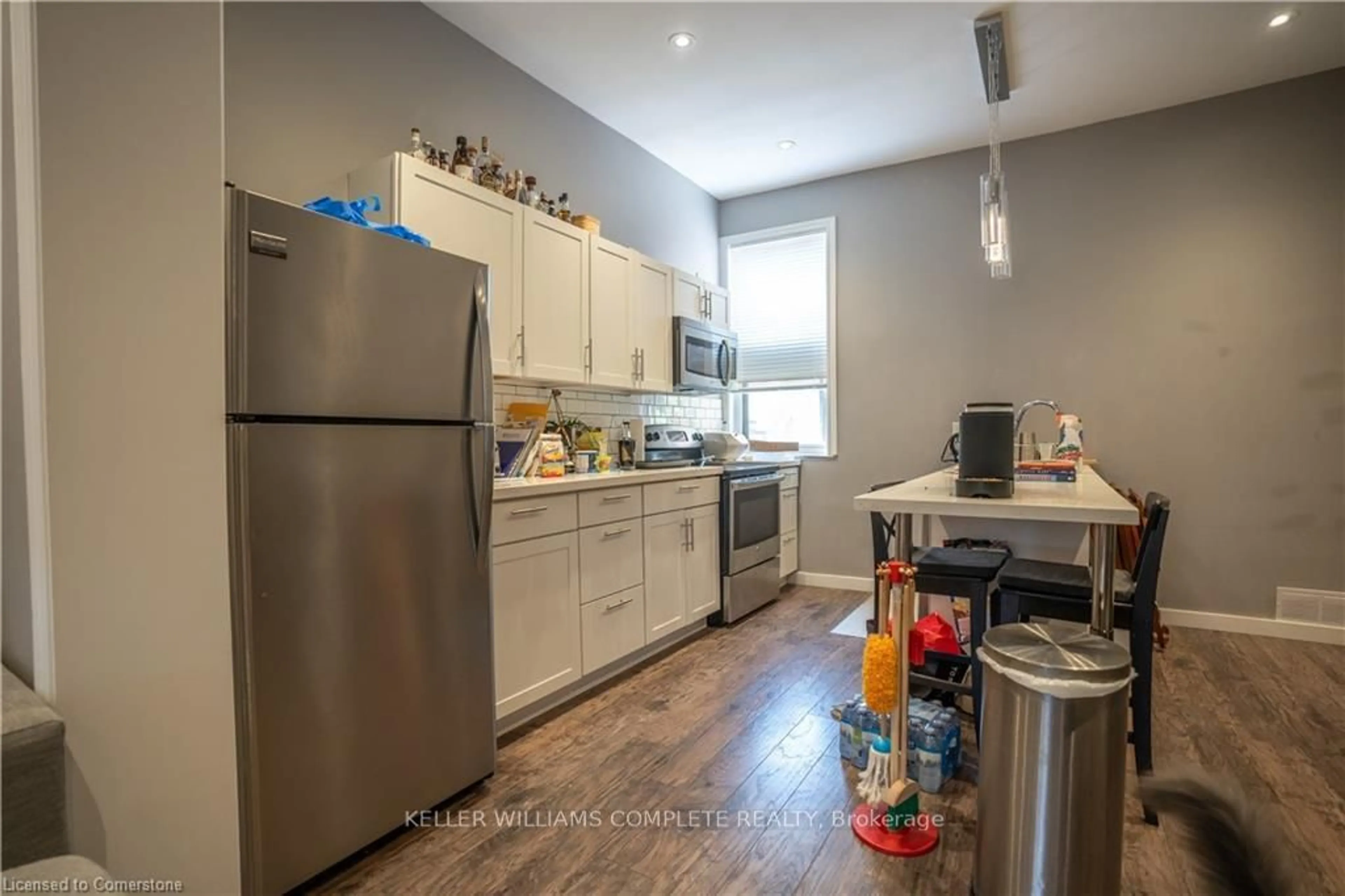 Standard kitchen, wood floors for 163 Emerald St, Hamilton Ontario L8L 5K9