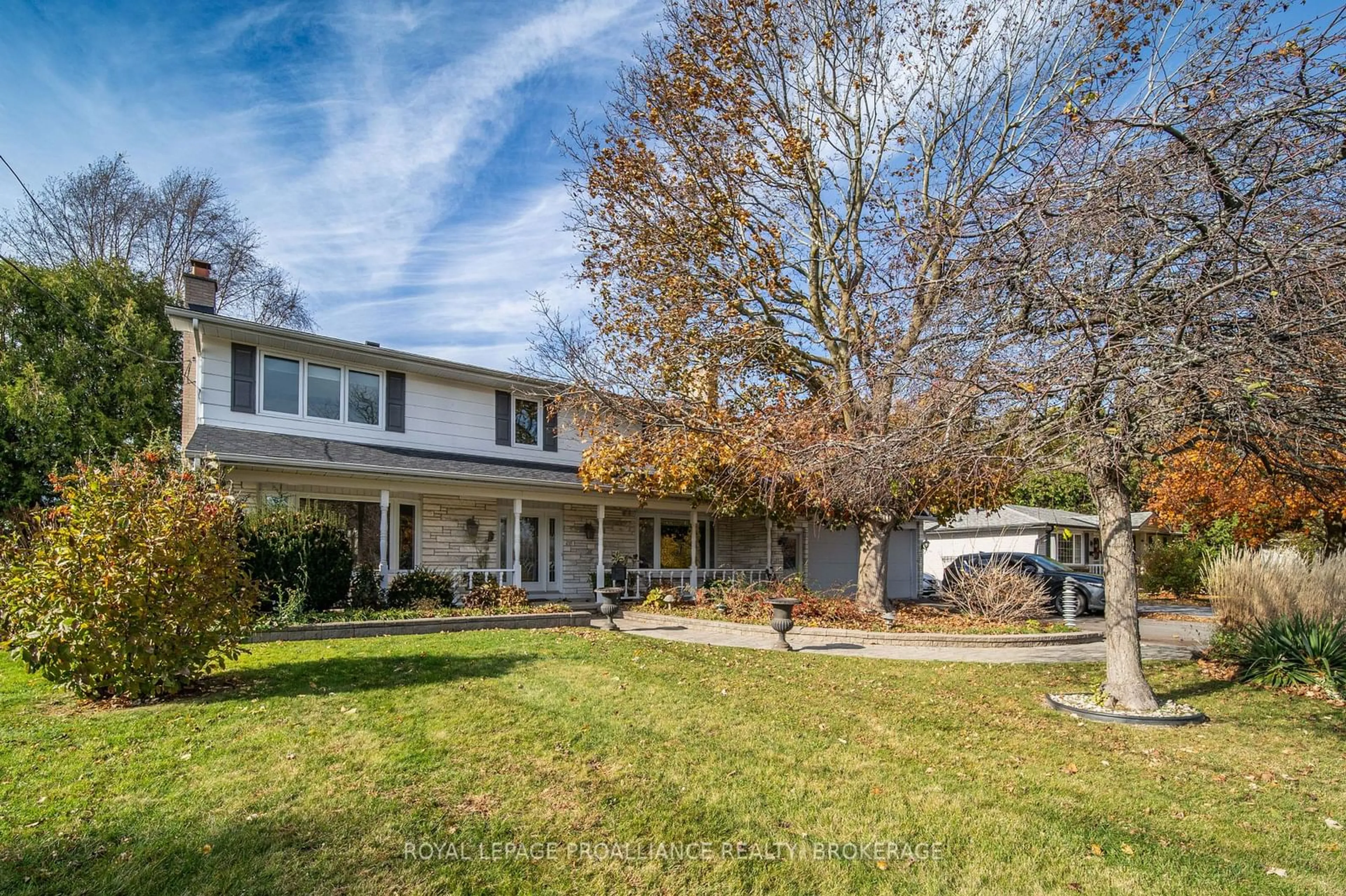 Frontside or backside of a home, the fenced backyard for 1021 Sydenham Rd, Kingston Ontario K7M 3L8