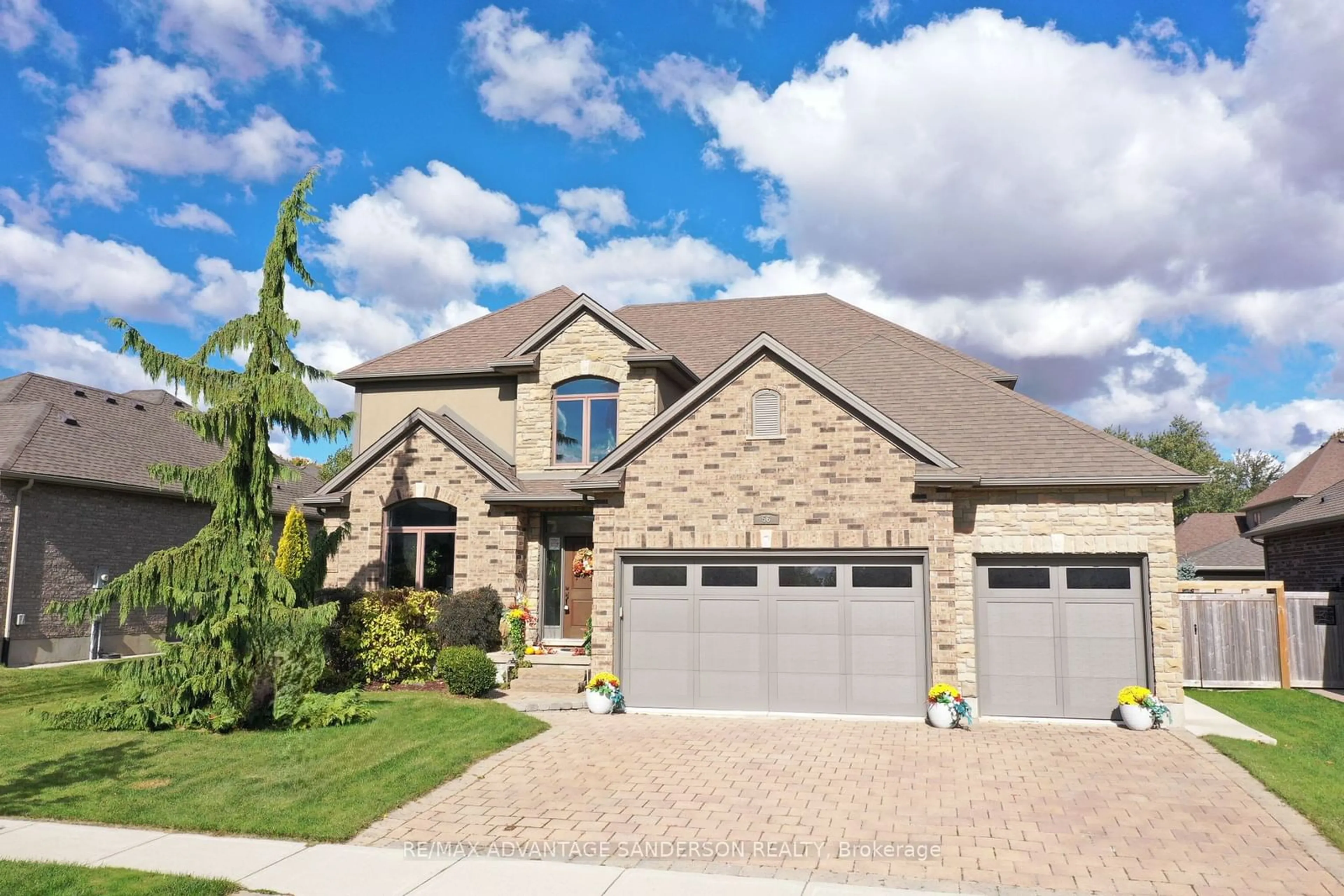 Home with brick exterior material for 56 Blue Heron Dr, Middlesex Centre Ontario N0M 2A0